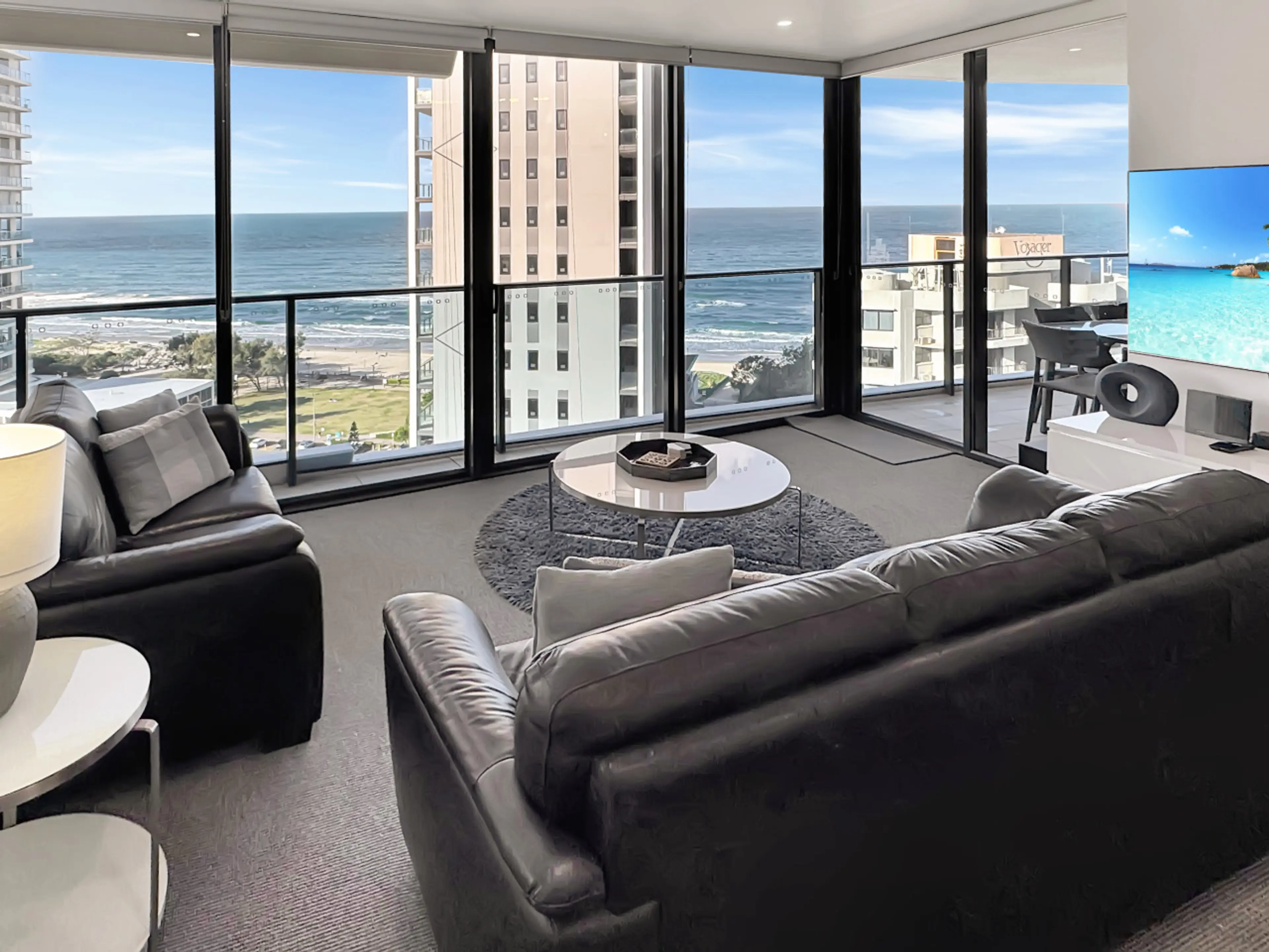 Open plan living and dining with ocean views