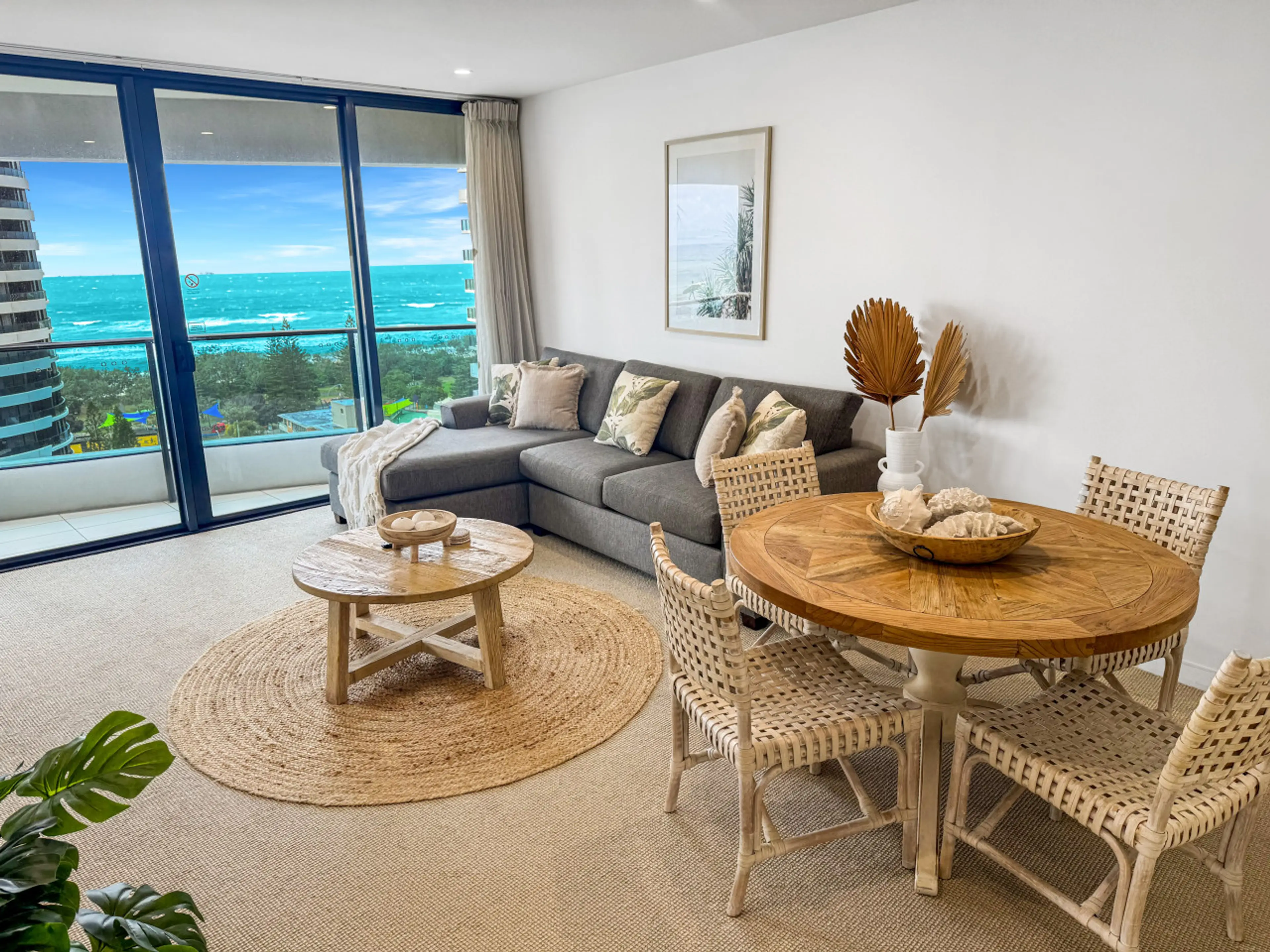 Stylish open plan living and dining with ocean views