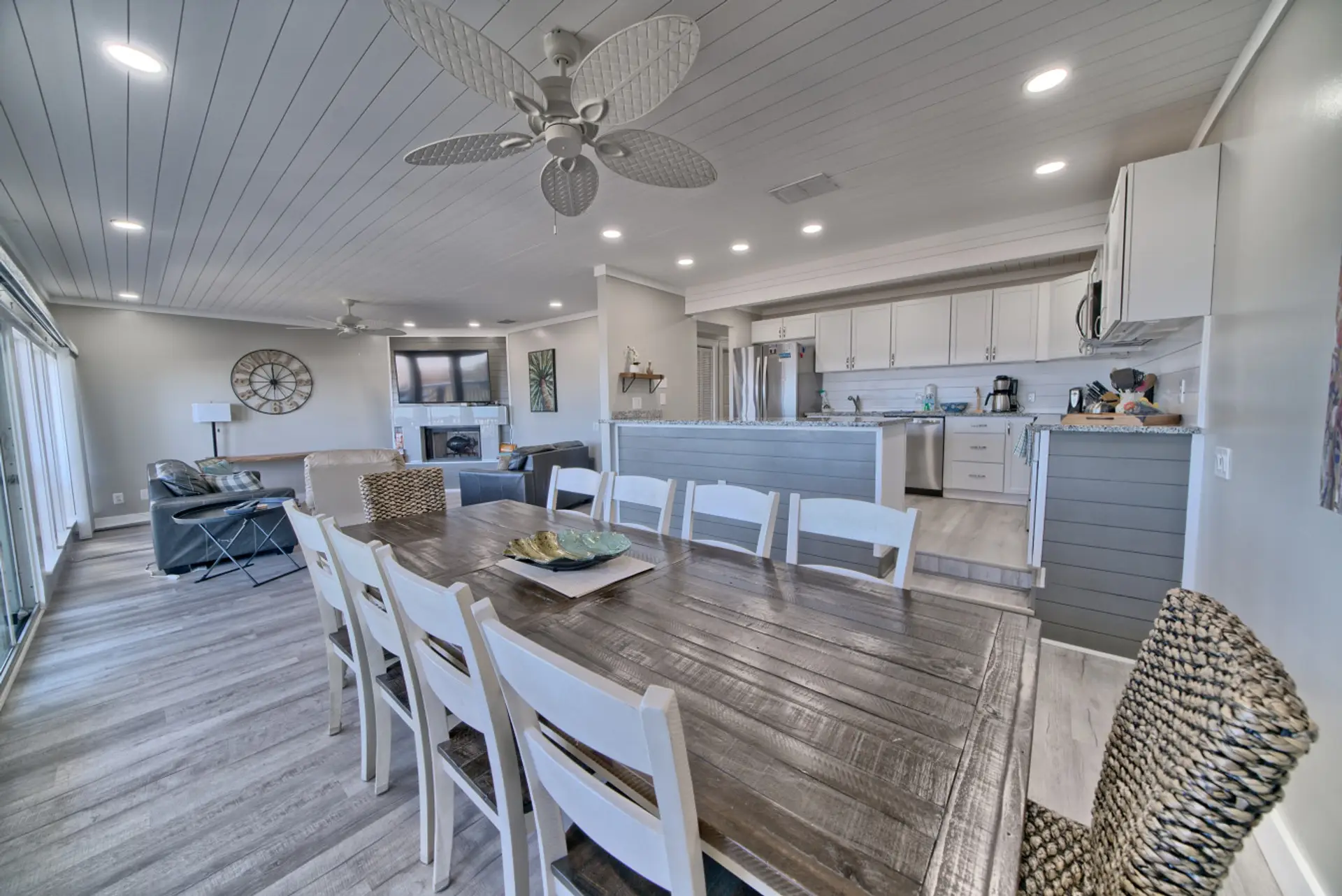 Open layout with cozy seating, a large dining table, and a smart TV-ready for fun