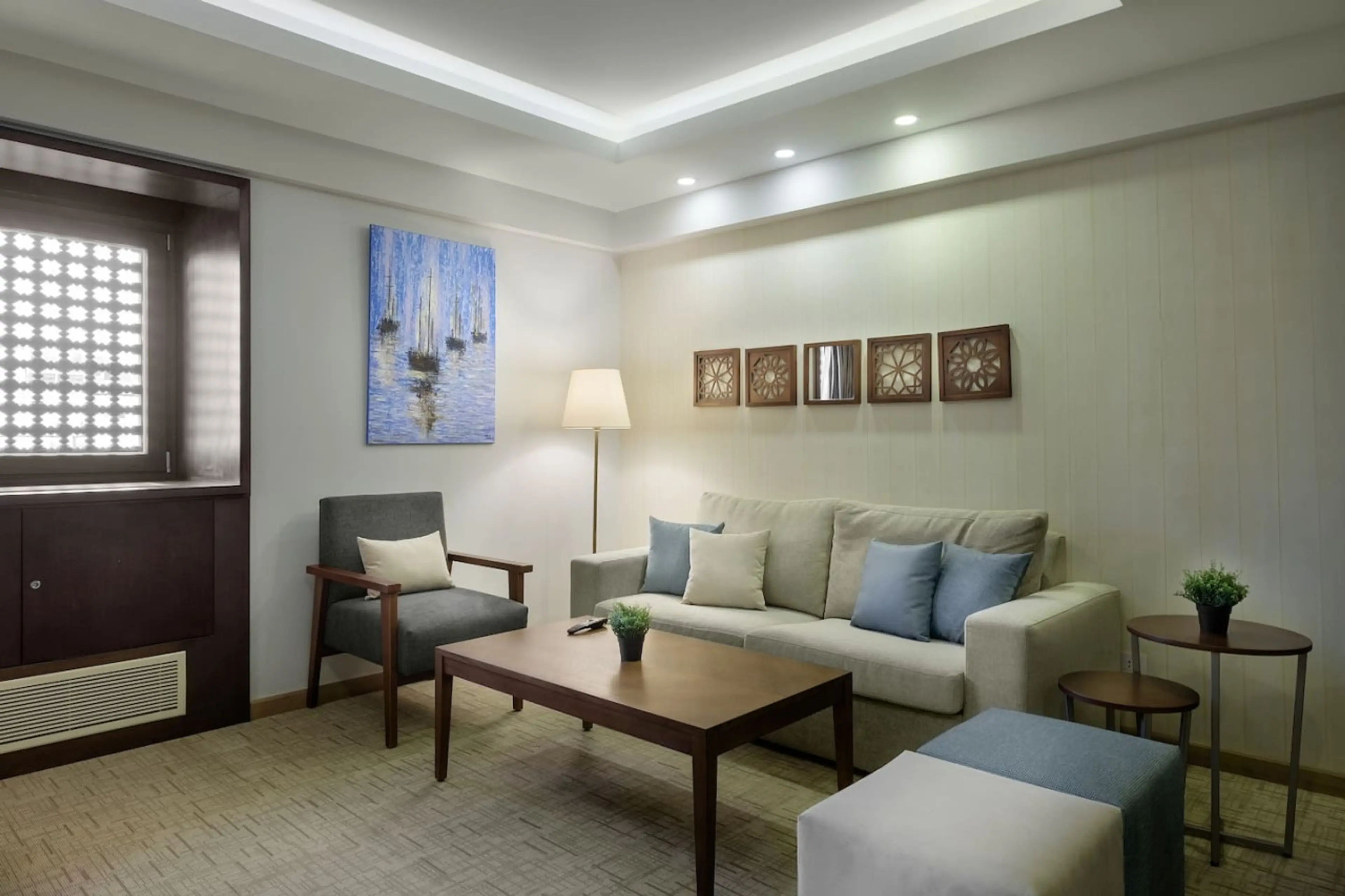 A different angle, same comfort. Sink into the sofa or chairs and unwind in this inviting space.