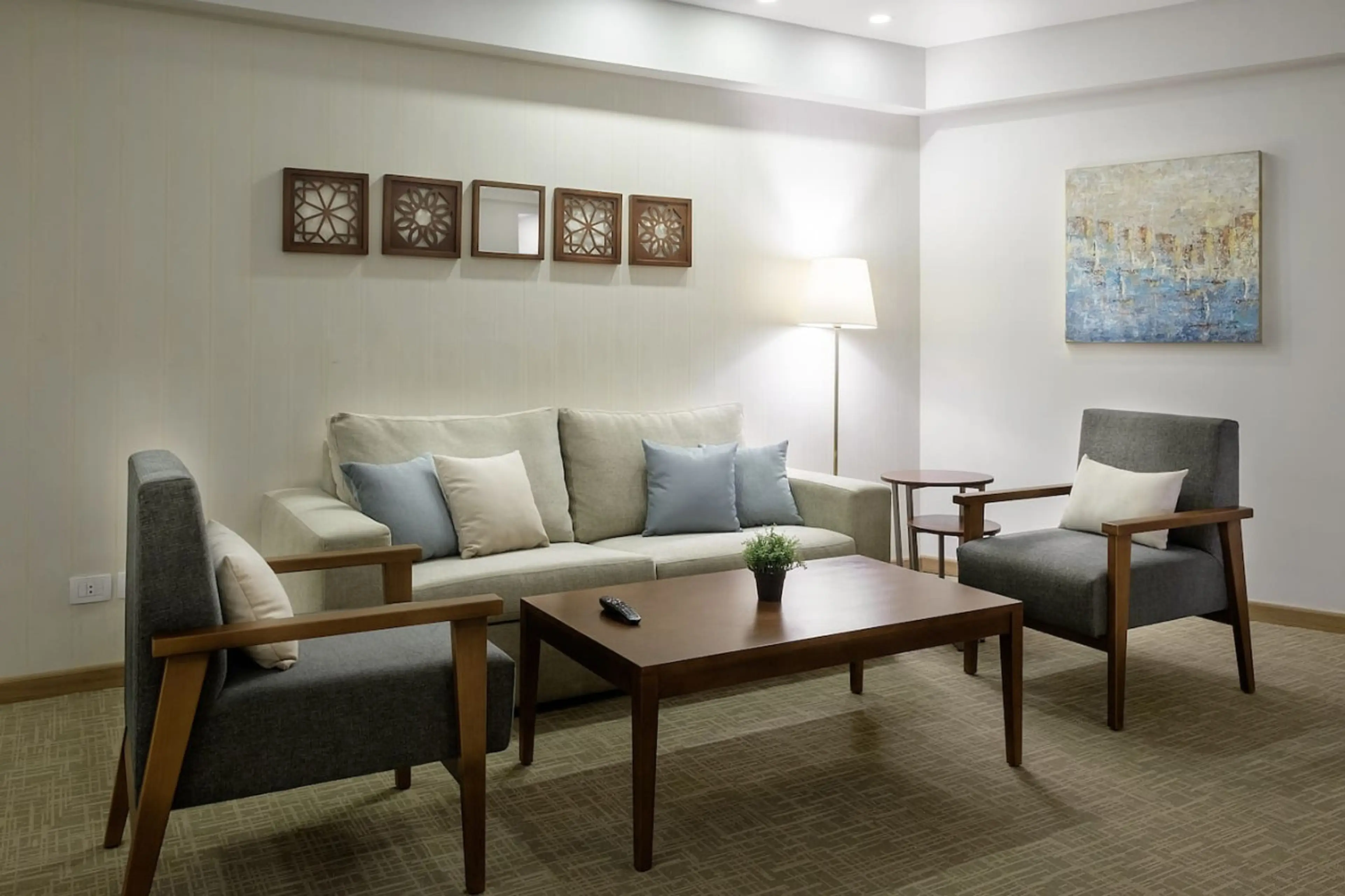 Cozy up in the living room—Arabesque art adds charm to your chill time.