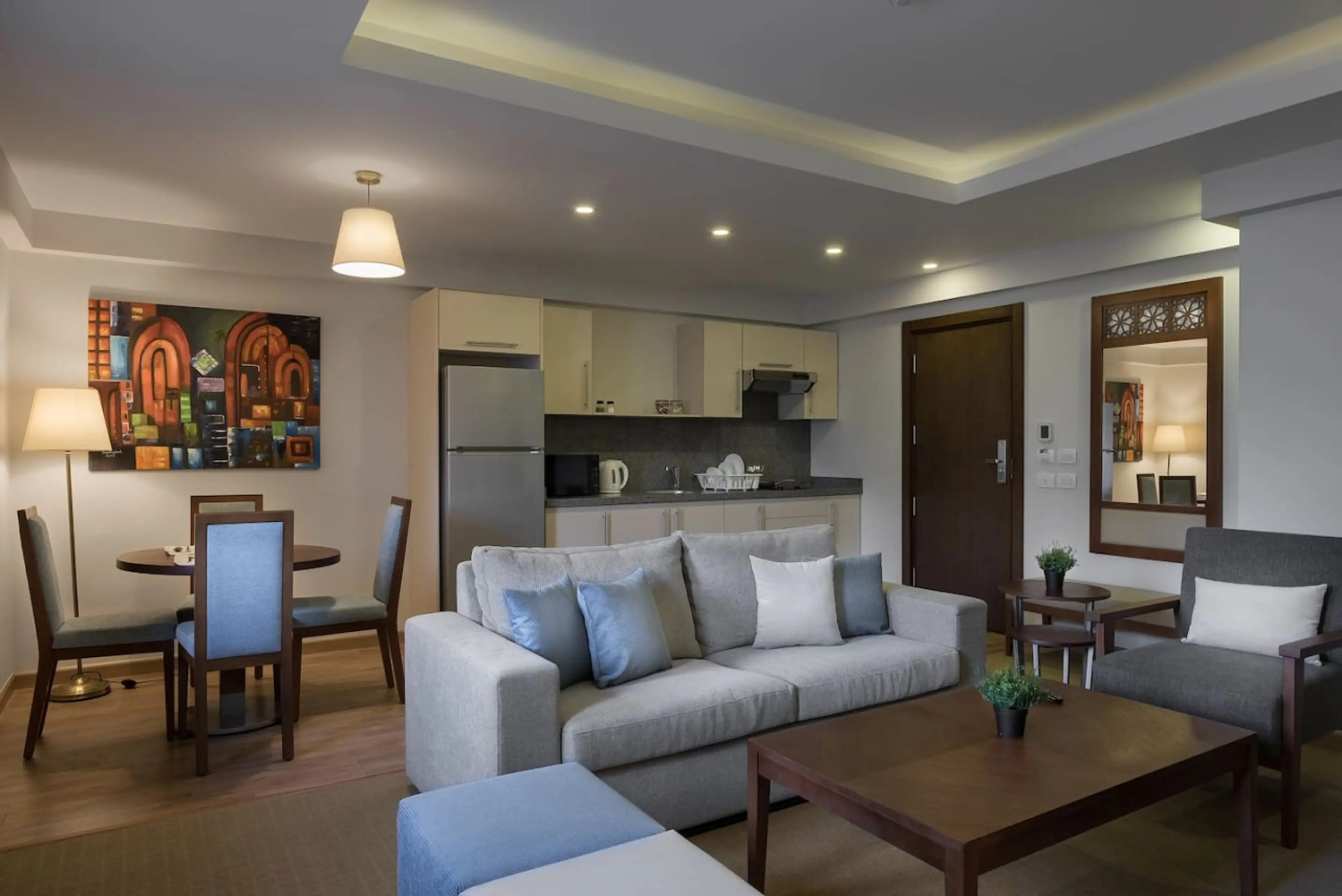 Flowing together! A stylish mix of living, dining, and kitchen areas for seamless living.
