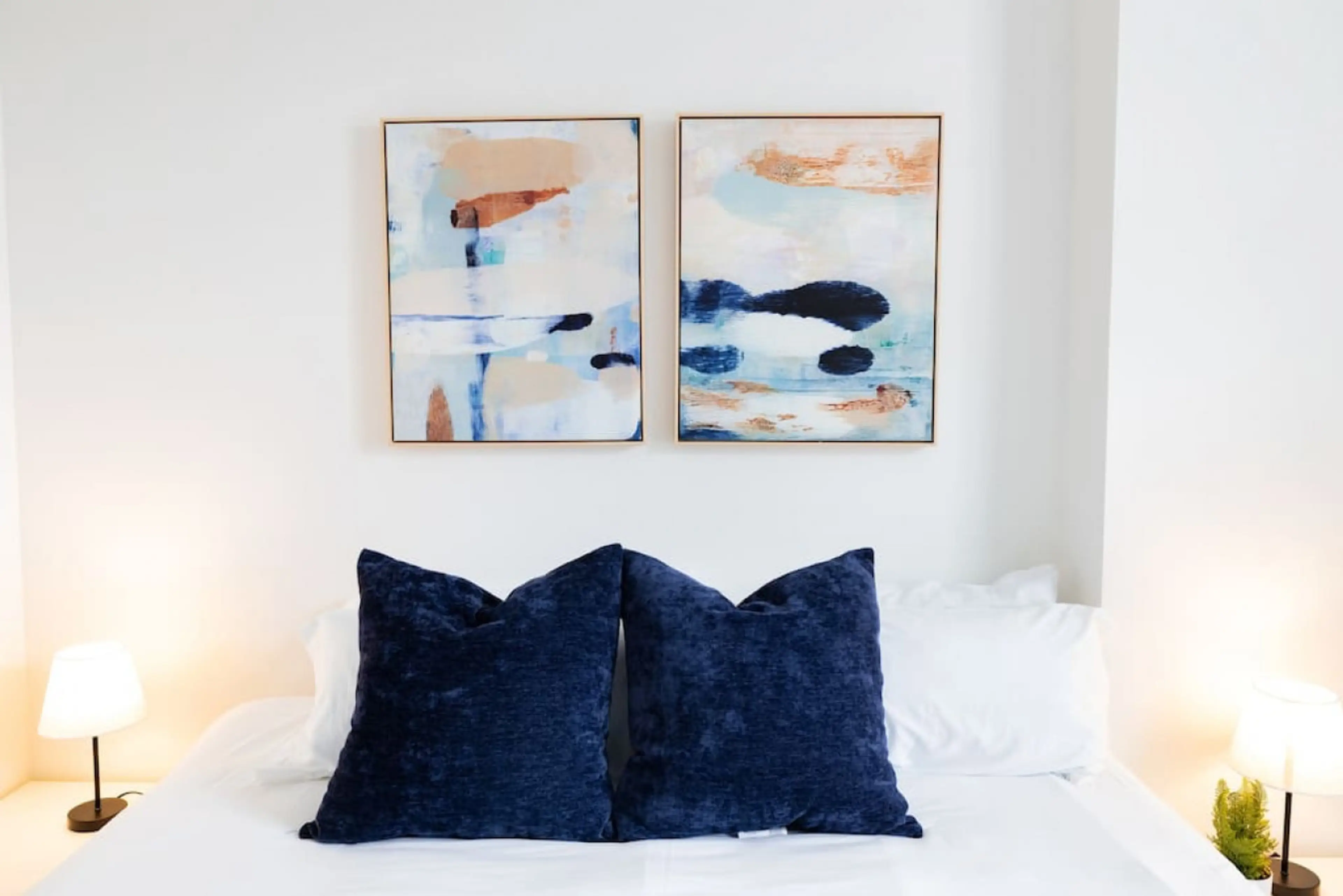 The bedroom’s serene ambiance invites you to relax, with a plush bed that promises a restful night's sleep.