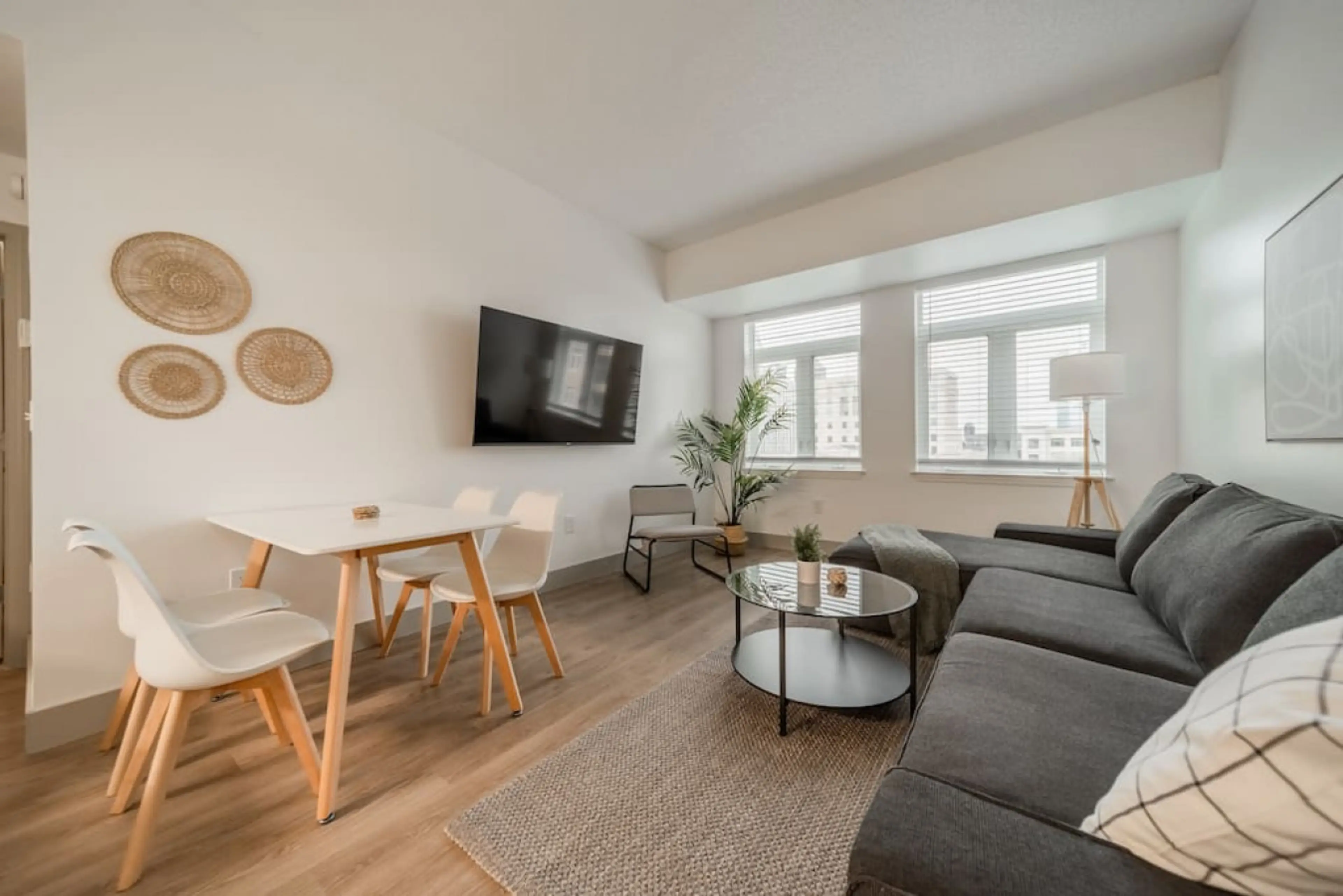 The dining room is bathed in natural light, creating a bright and inviting space where every meal feels special.