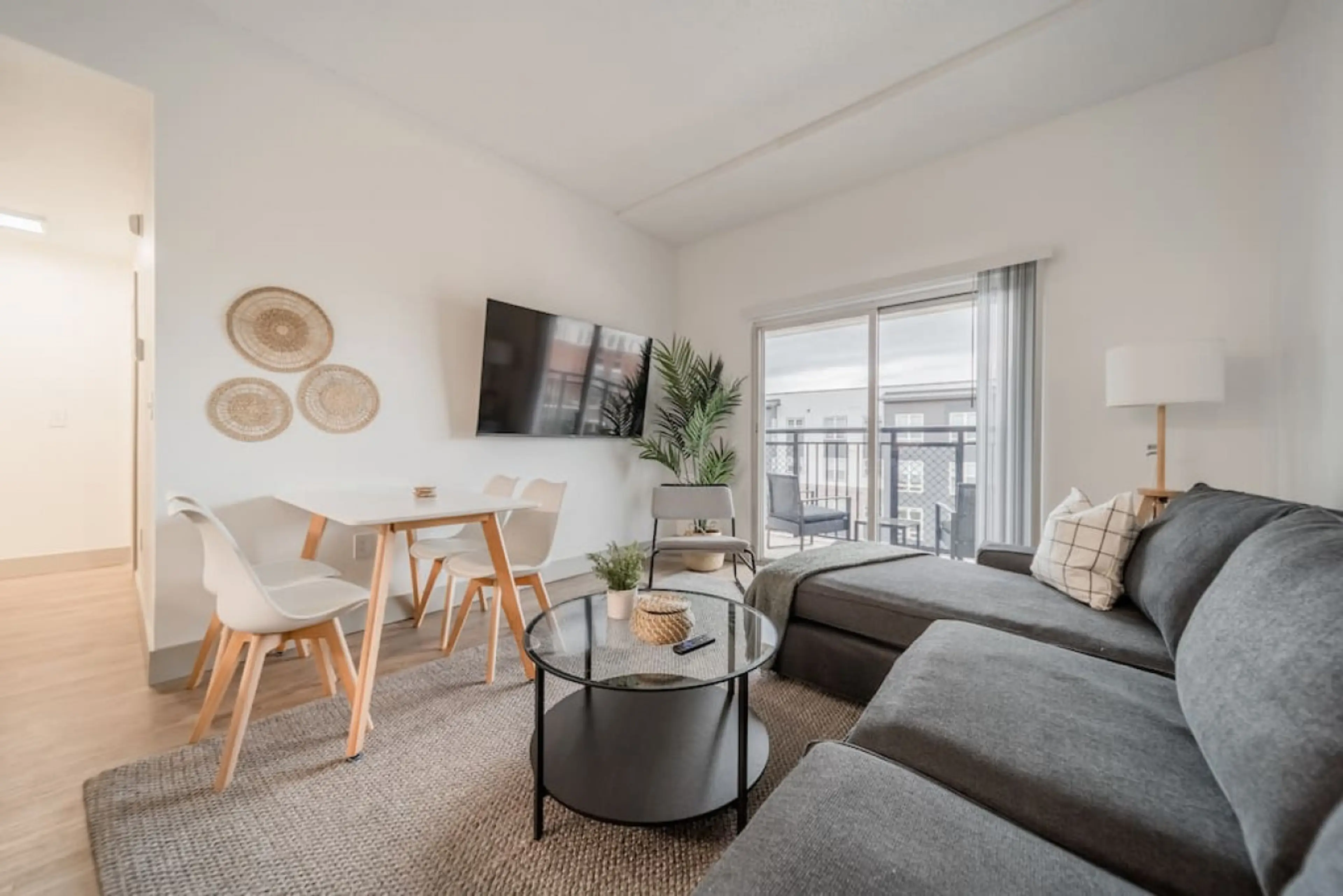 The living room’s cozy vibe makes it the perfect spot to relax, with ample seating and a warm ambiance.