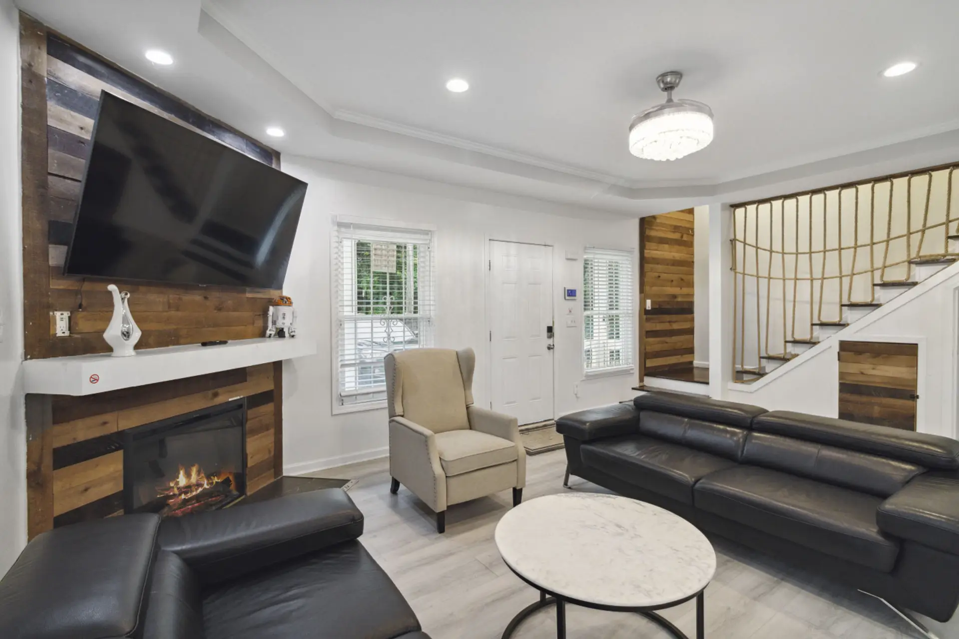 Welcome to your ultimate modern sanctuary — the living room where style meets comfort! Sink into sleek leather couches that scream luxury, surrounded by clean lines, bold accents, and a vibe so fresh it redefines contemporary living. This isn't just a liv