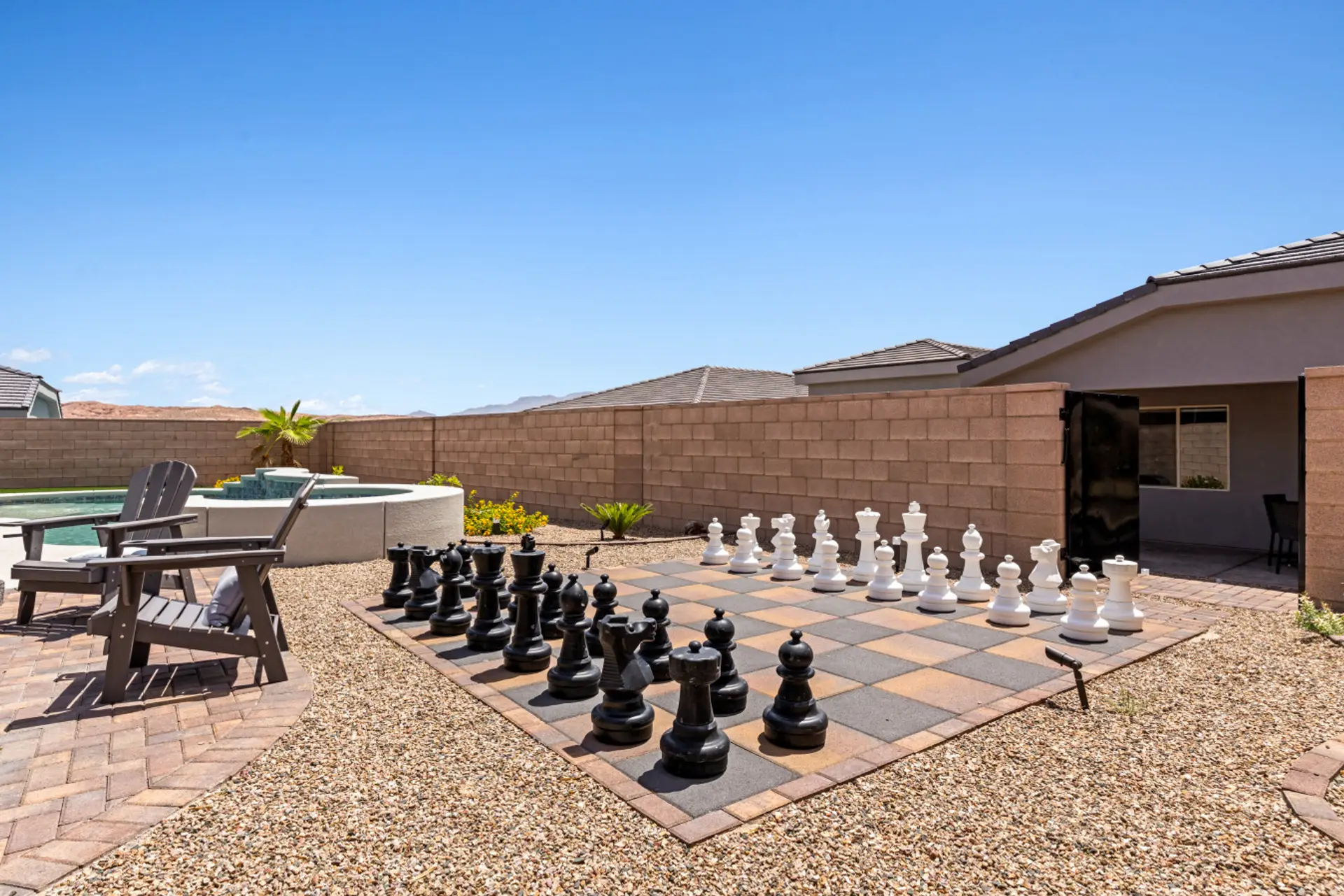Life size chess game and fire pit.