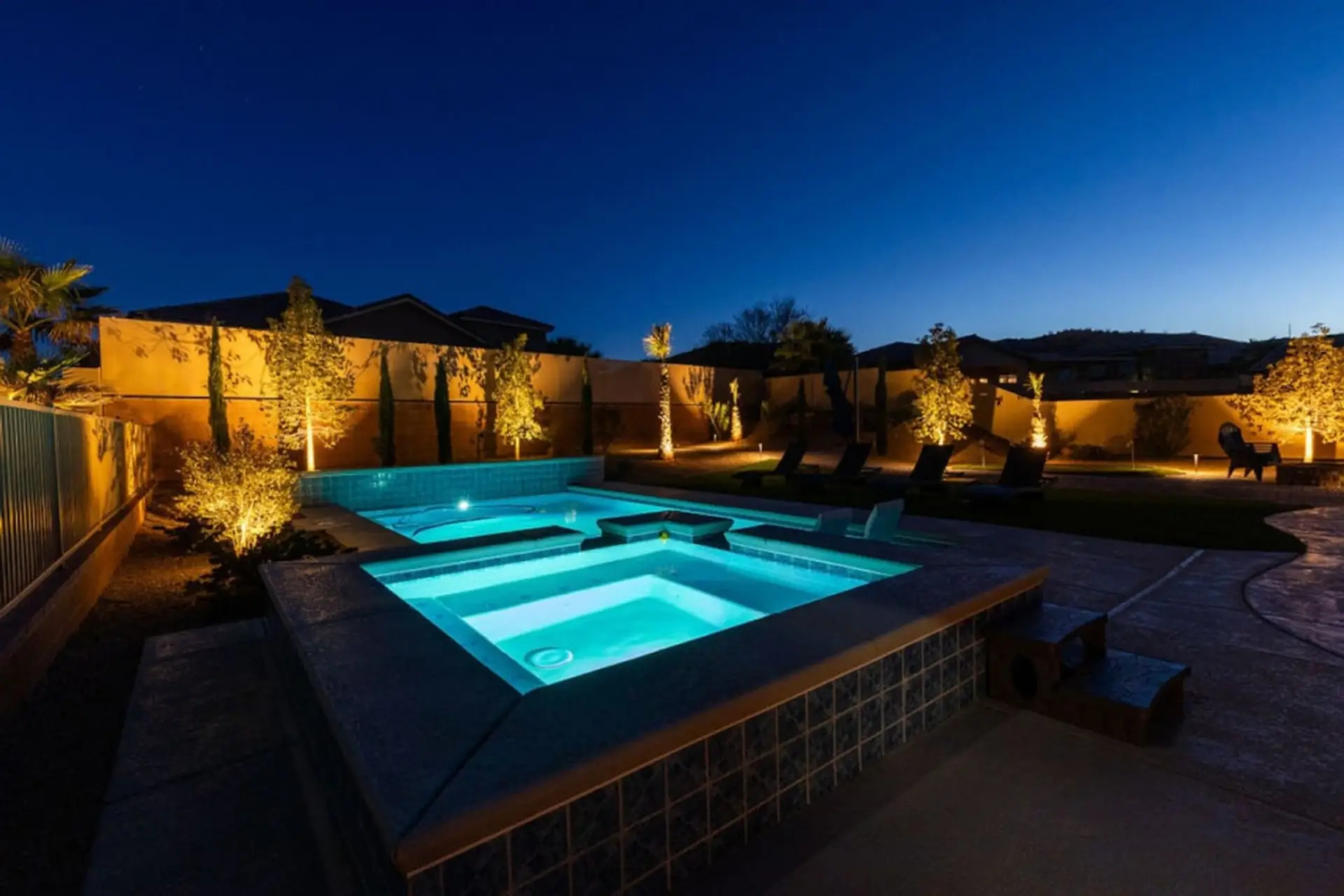 Stunning yard with pool and hot tub.