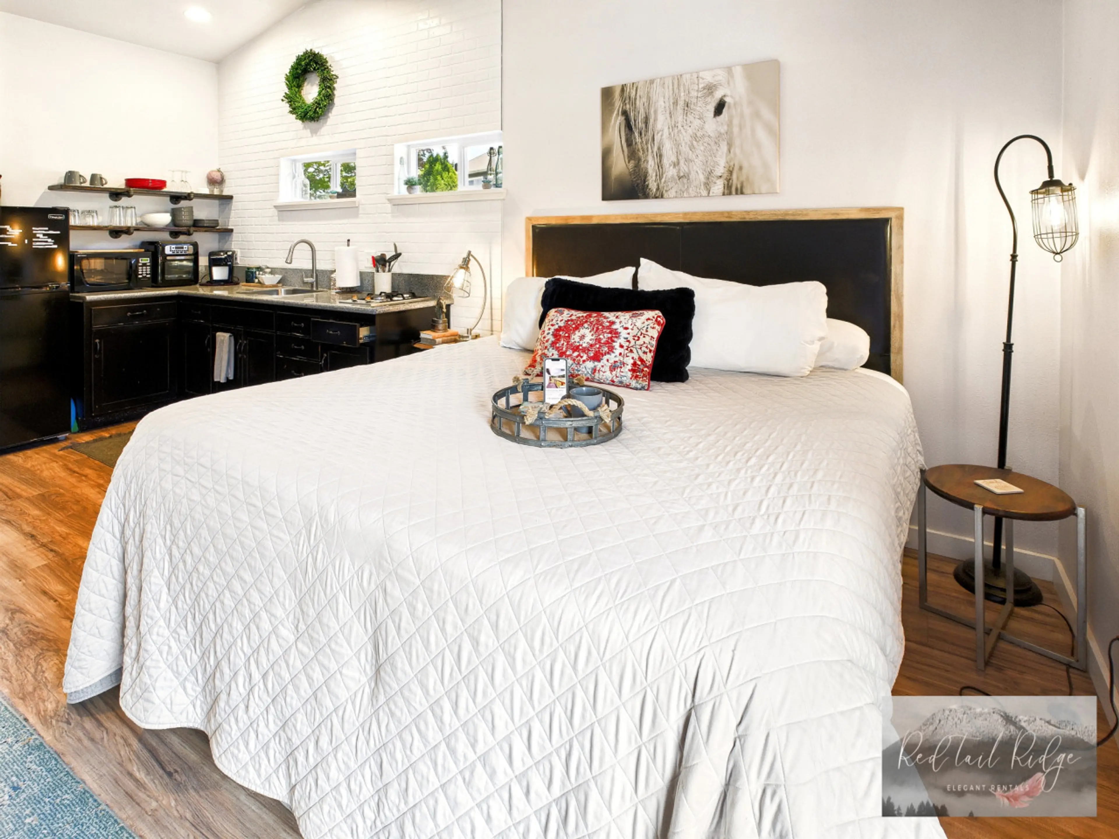 Wake up refreshed in this cozy loft bedroom with modern rustic charm.