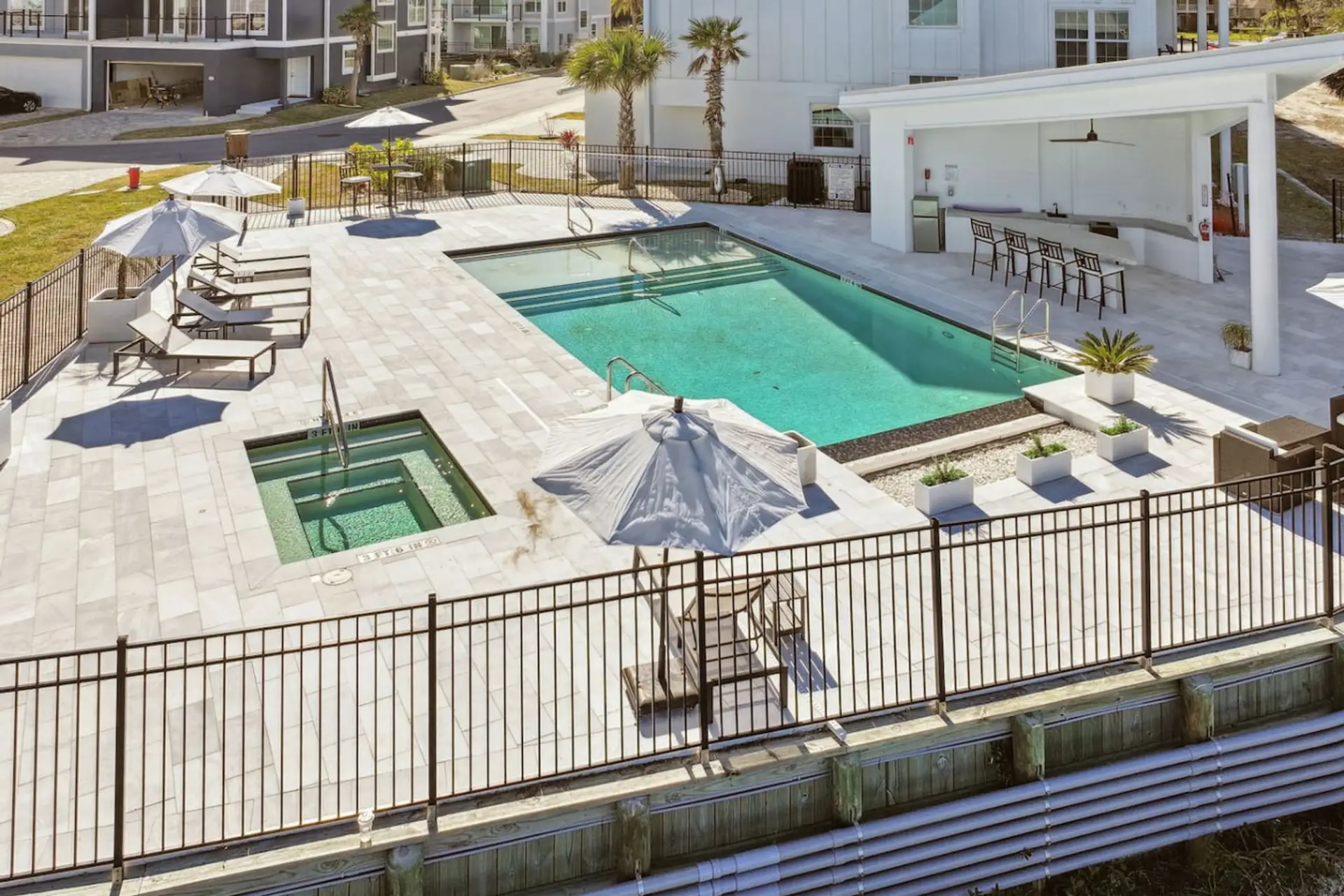 Enjoy a dip in the pool or lounge under the sun with a great beach view