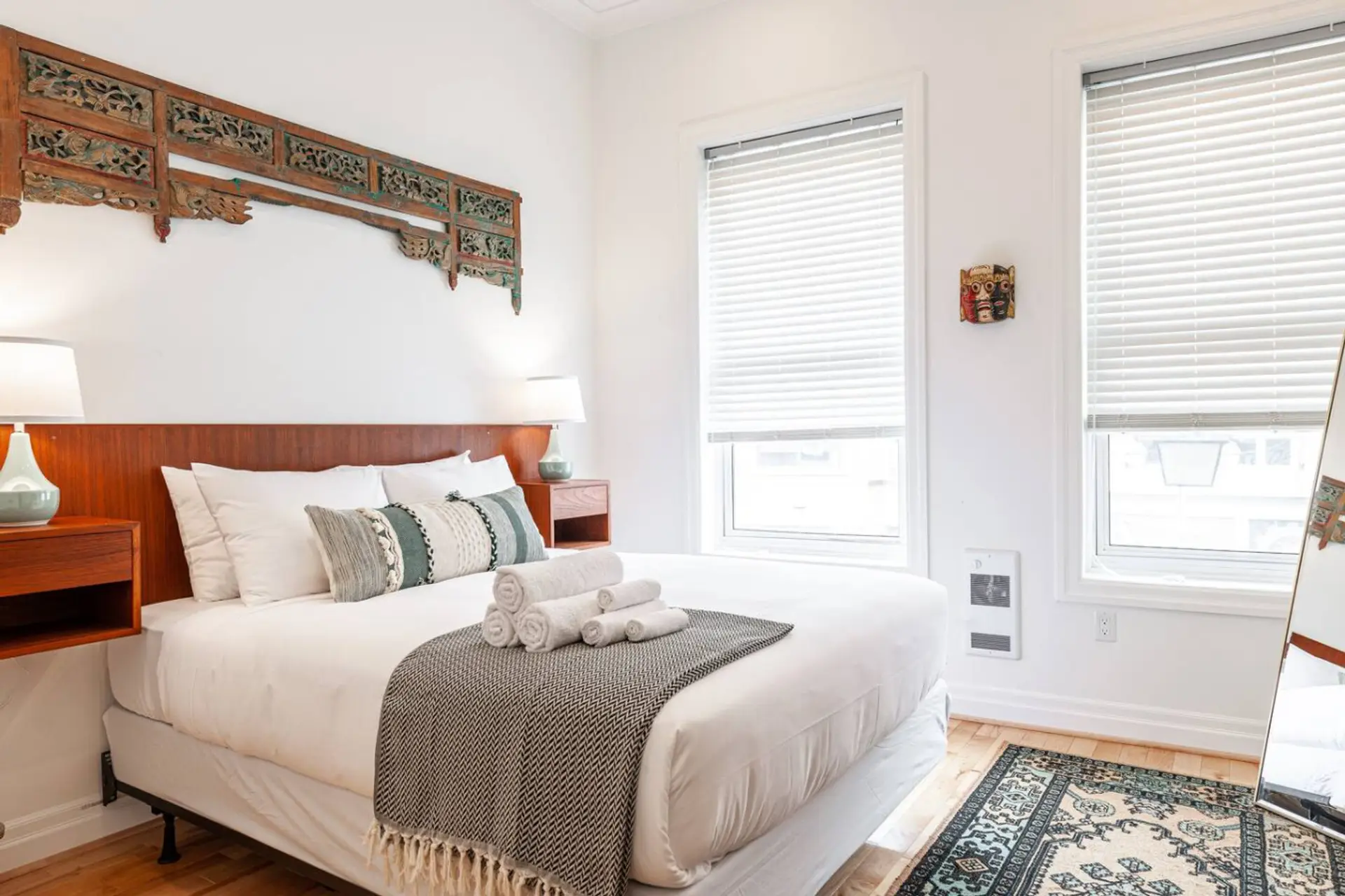 Natural light and curated decor define this cozy short-term rental in Stratford, with nods to both art and comfort.
