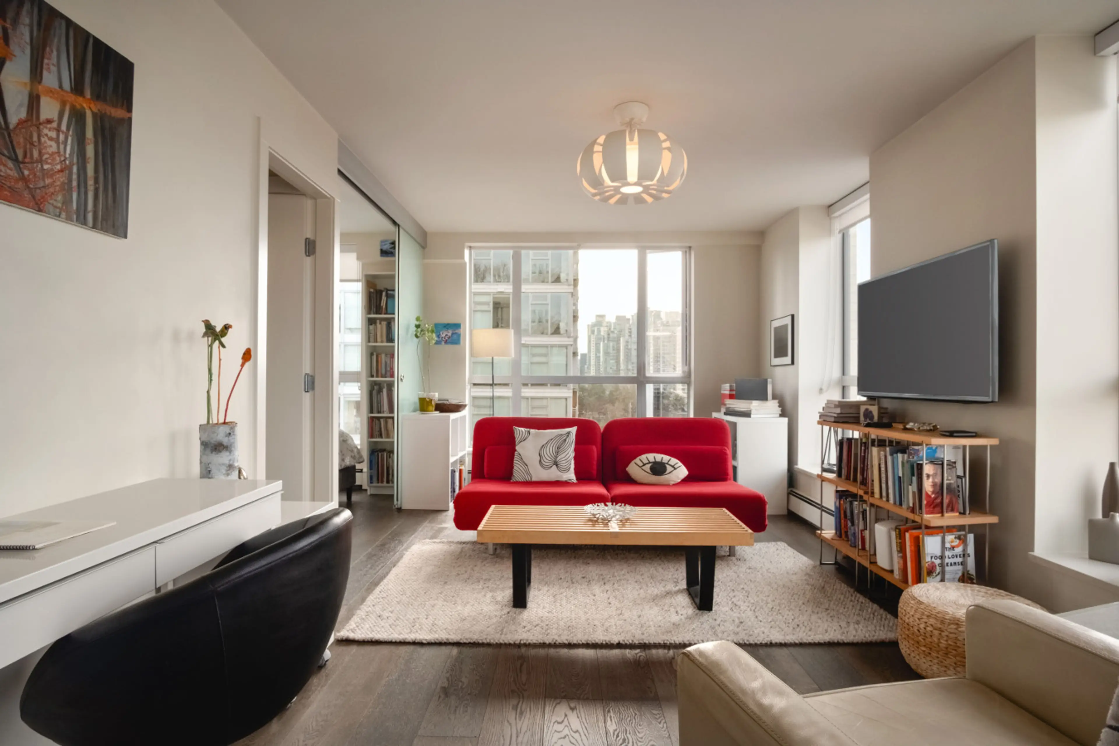 Bright modern living room with office space