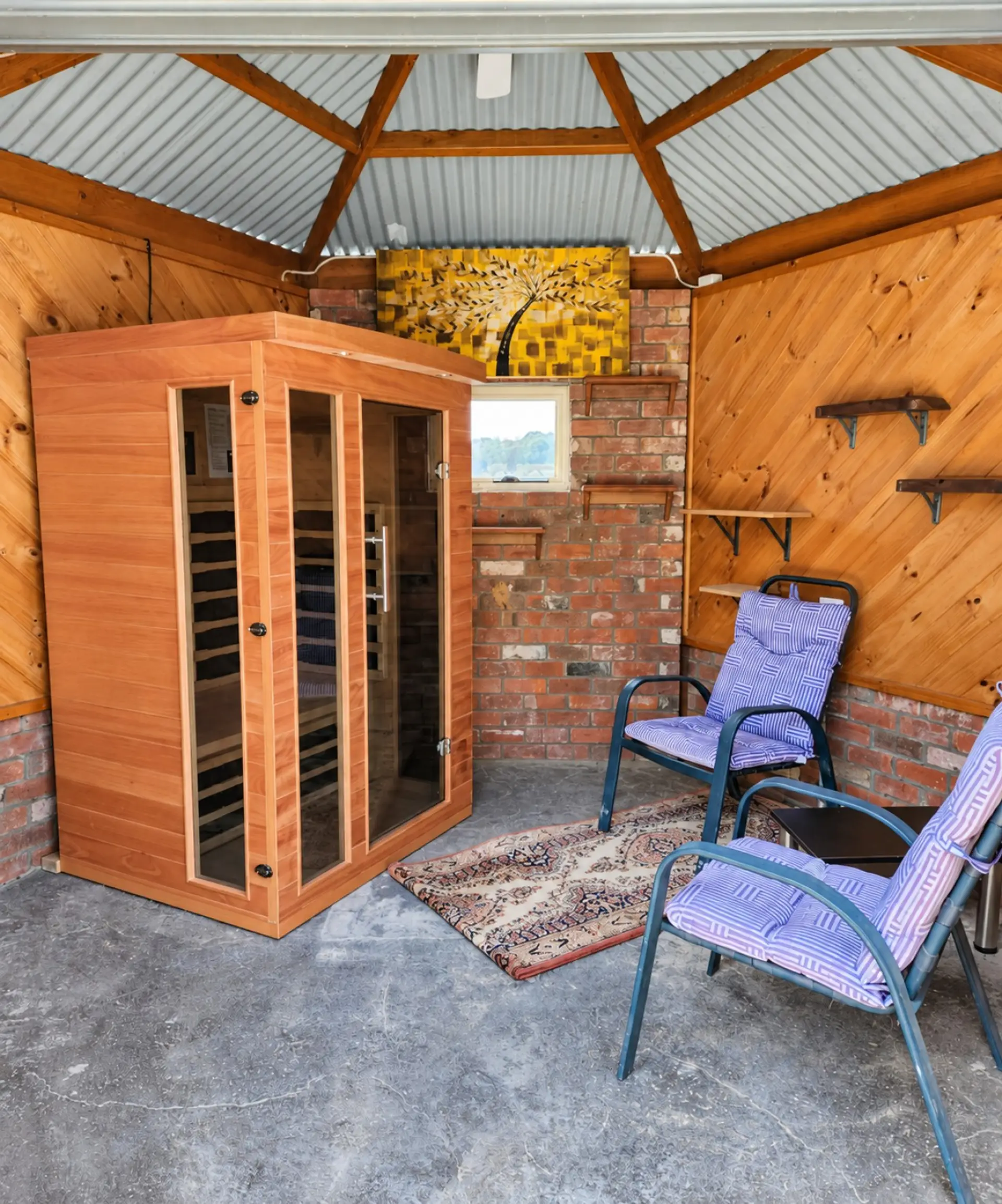 Two-person wellness sauna in the poolside cabin.