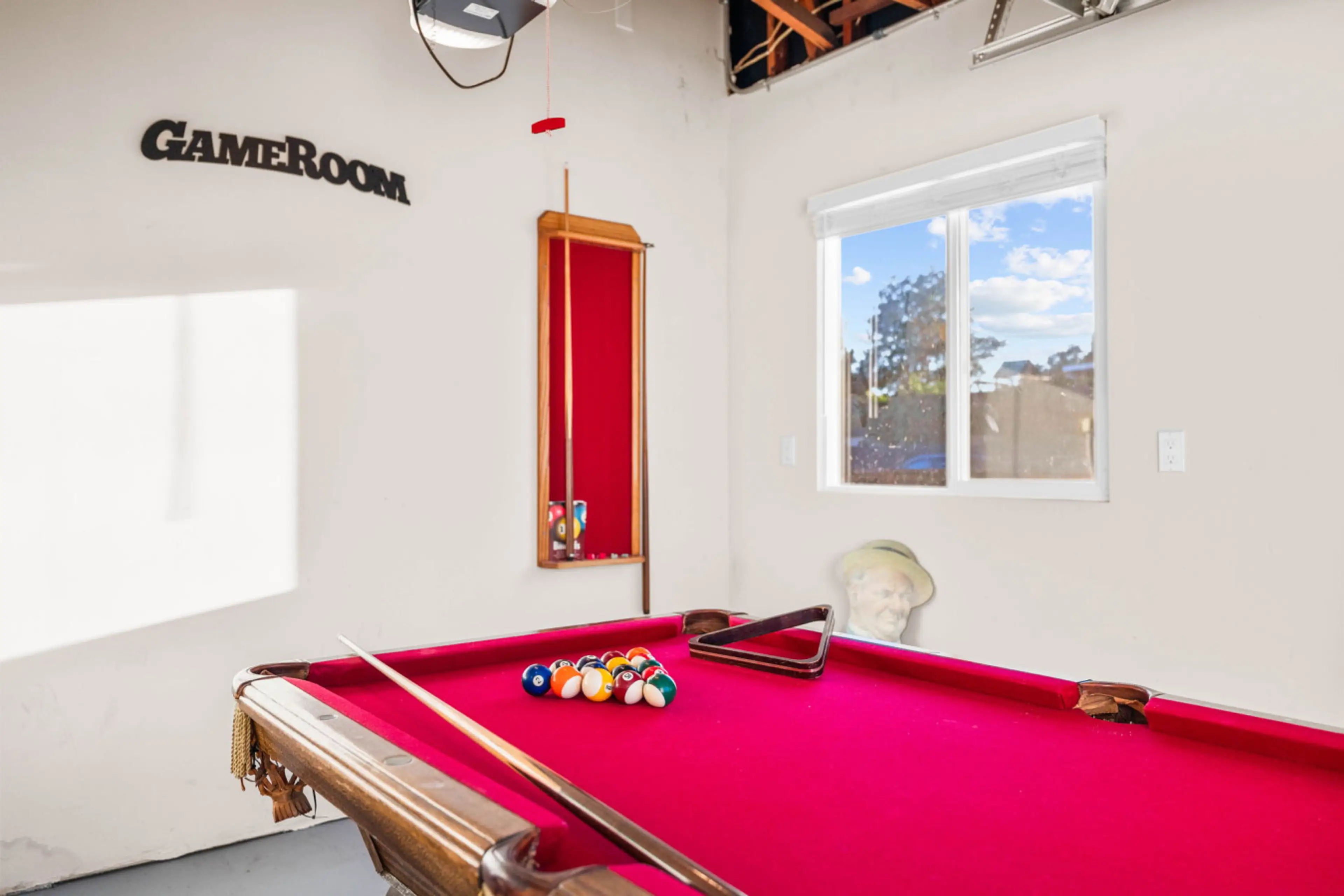 We transformed the garage into a fun game room complete with a pool table—perfect for some friendly competition and laid-back hangouts during your stay!