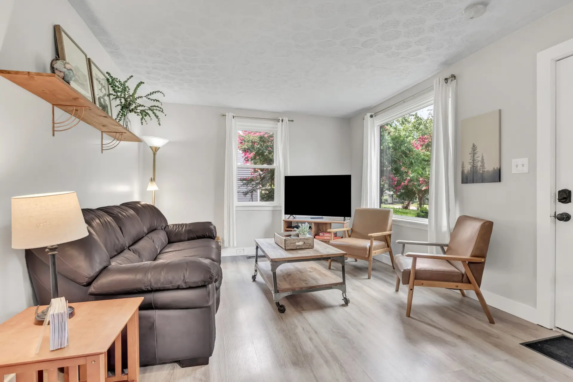 Living Room with a Smart T.V. so guests can log into their streaming services.