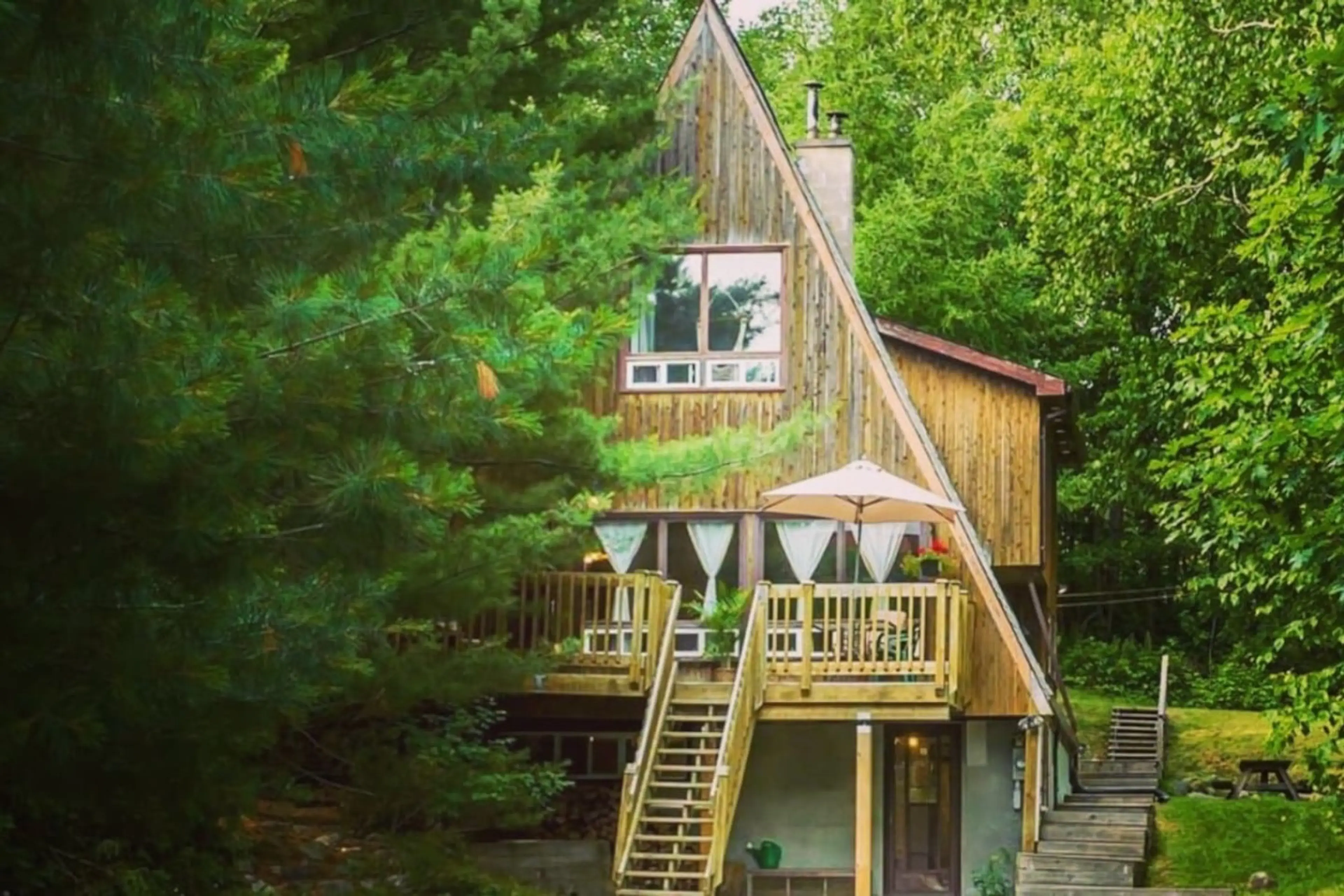 Tucked away in a lush forest setting, this charming A-frame retreat is your escape to peace and nature. Enjoy mornings on the sunlit deck with a cup of coffee, afternoons exploring the trails, and evenings under the stars. Every moment here invites you to
