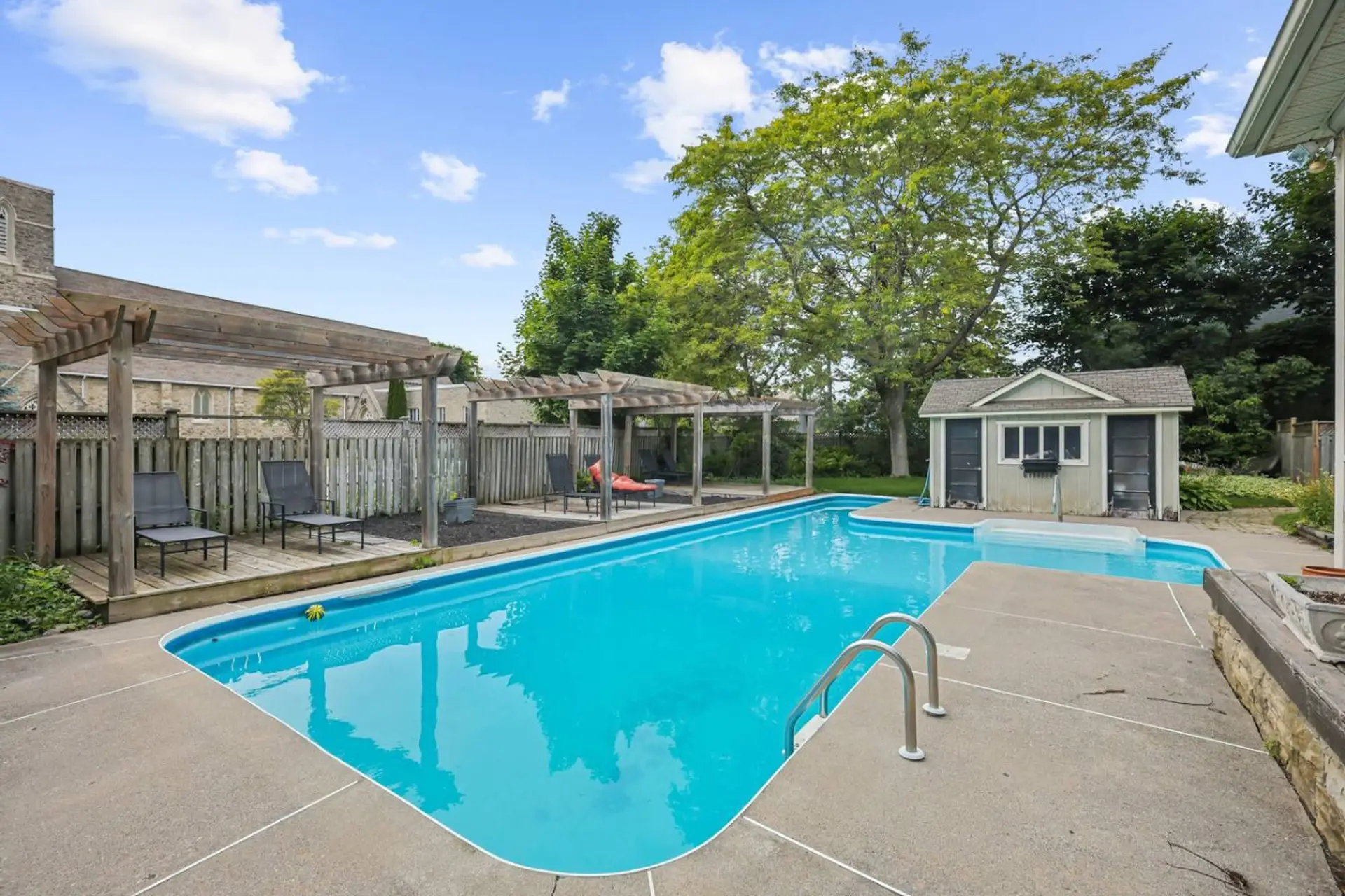 Soak up the sun by our private pool. Whether you're taking a refreshing dip or lounging under the pergolas, this backyard oasis is the perfect escape for a day of relaxation and fun.