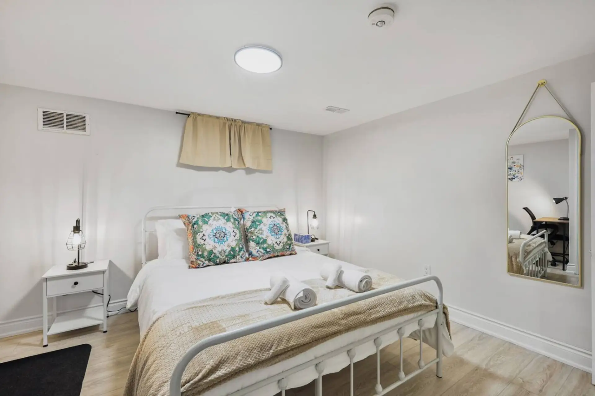 Drift into comfort in this bright and welcoming bedroom, complete with a cozy bed, stylish accents, and thoughtful touches. A restful retreat designed for relaxation after a busy day.
