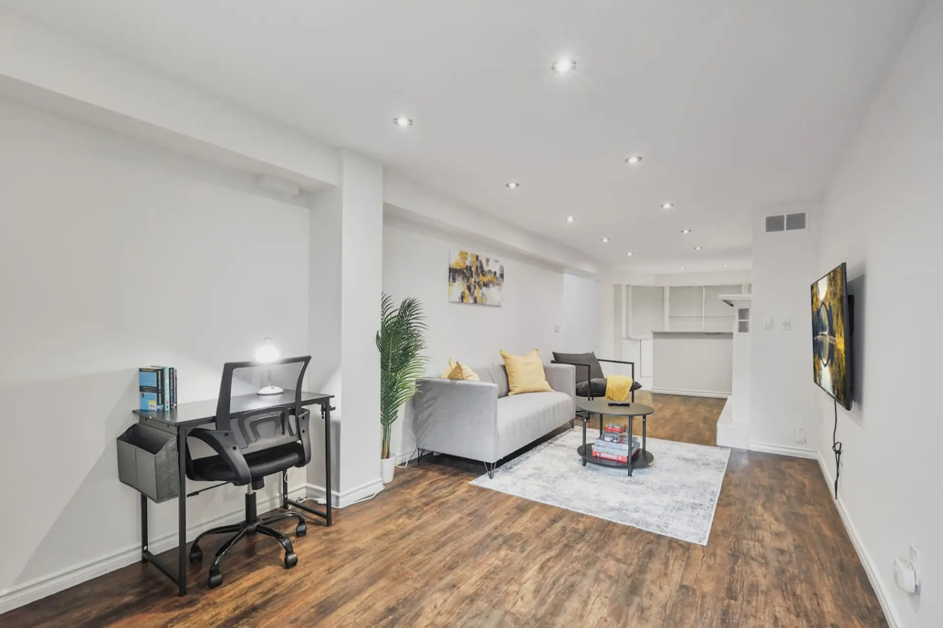 Sleek design meets function. This bright, modern space is perfect for work and relaxation. Enjoy the dedicated desk area and unwind on the comfortable sofa after a day out. Your stylish home away from home awaits.