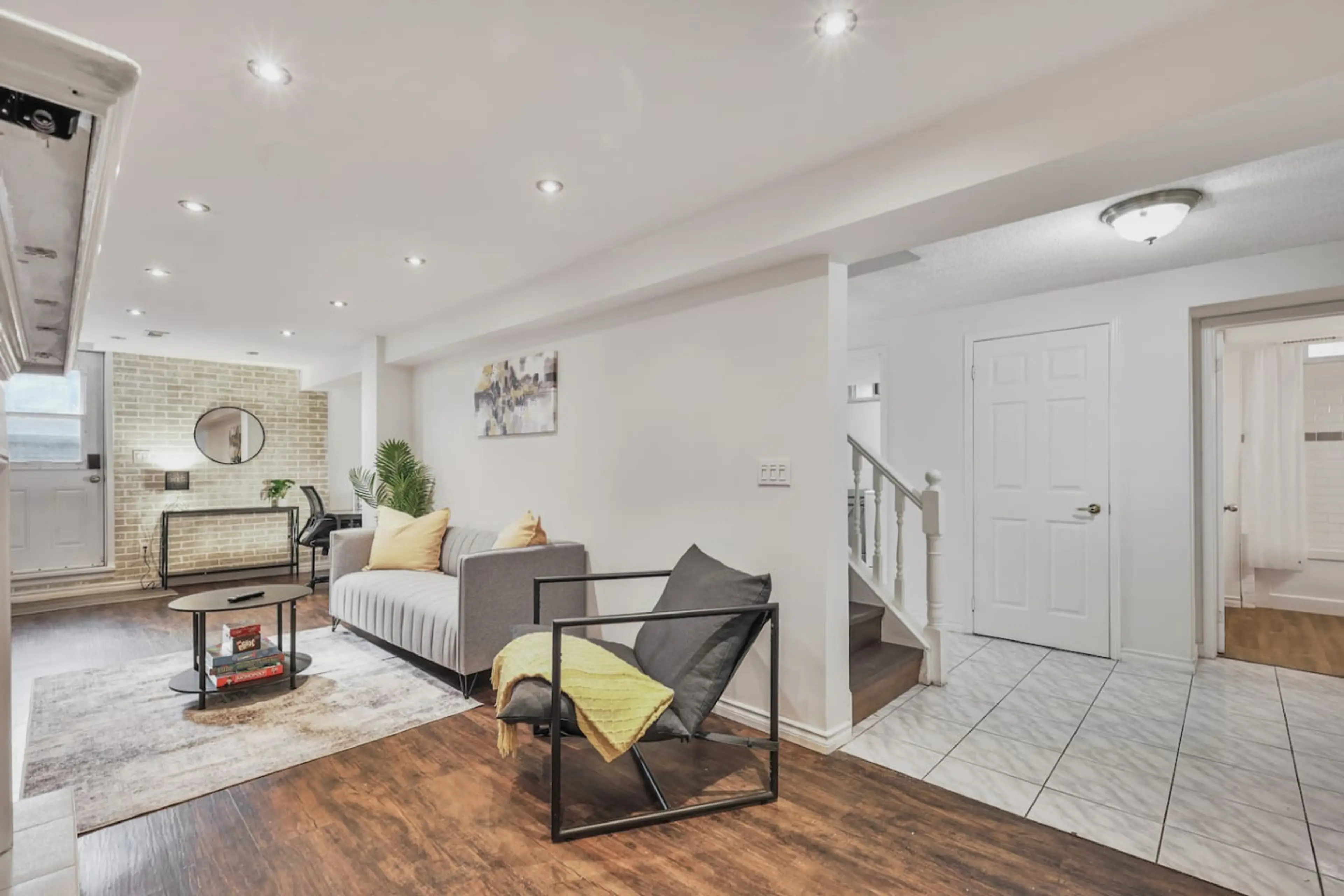 Relaxation defined. Enjoy the modern, light filled living area with distinct zones for unwinding and preparing for the day. Stylish decor and a cozy ambiance ensure a memorable and comfortable stay.