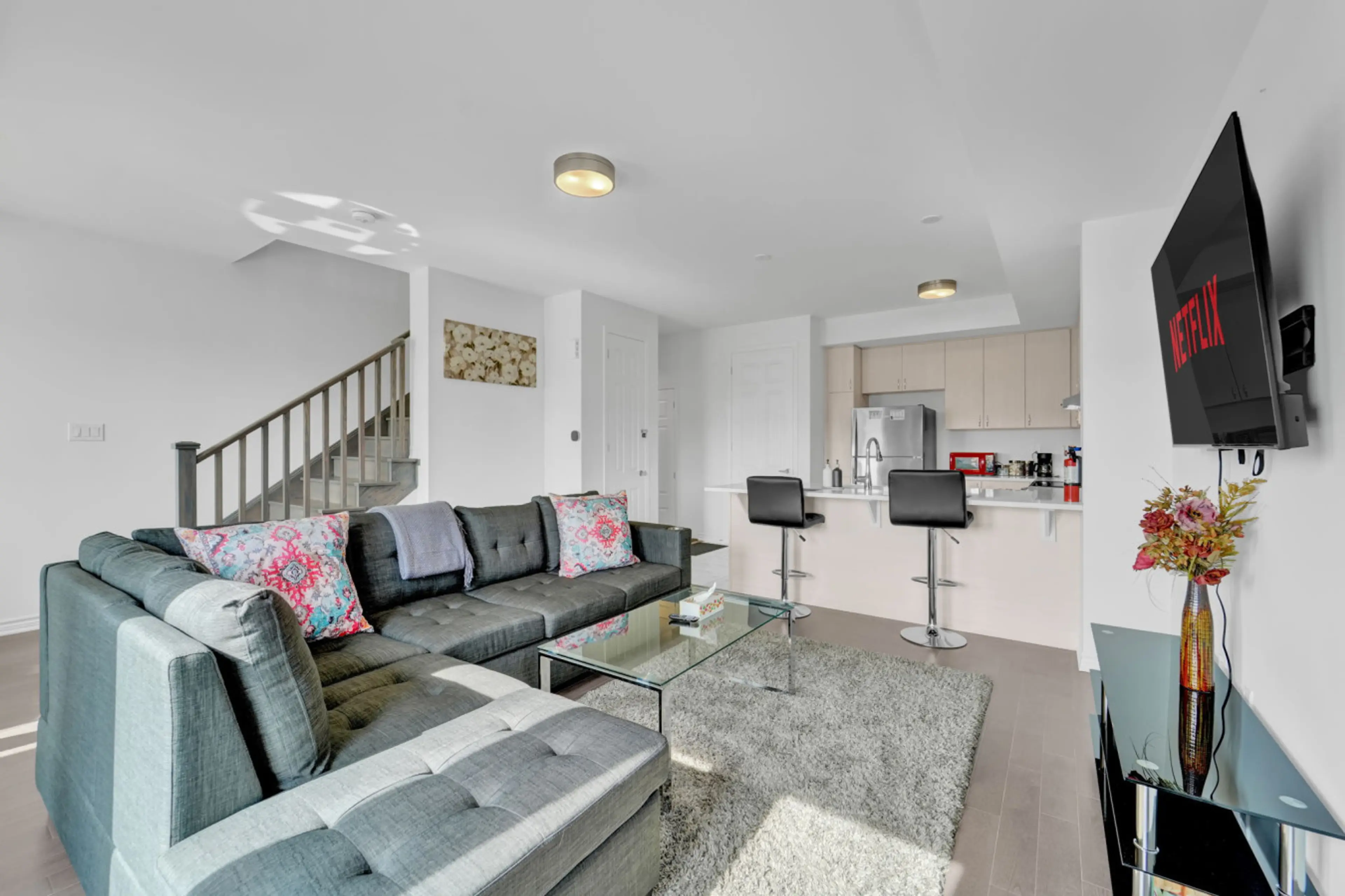 Unwind in a modern open concept retreat designed for relaxation. Whether you are prepping a meal in the bright kitchen or curling up for a movie night, this stylish space offers the perfect home base for your next getaway.