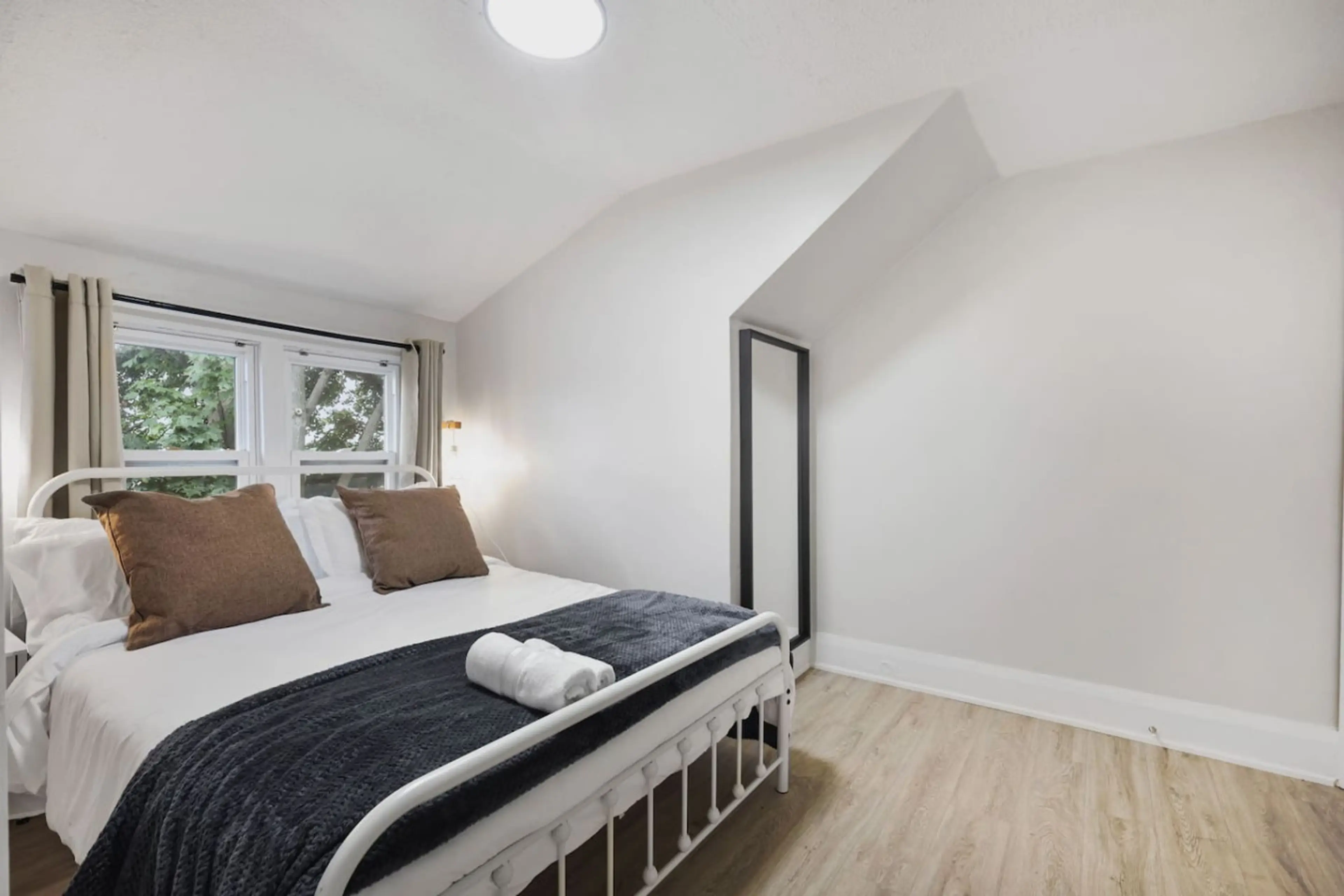 Wake up to natural light and a peaceful view of the outdoors. This comfortable retreat offers a restful atmosphere where you can unwind after a day of exploring, ensuring you feel completely recharged for your next adventure.