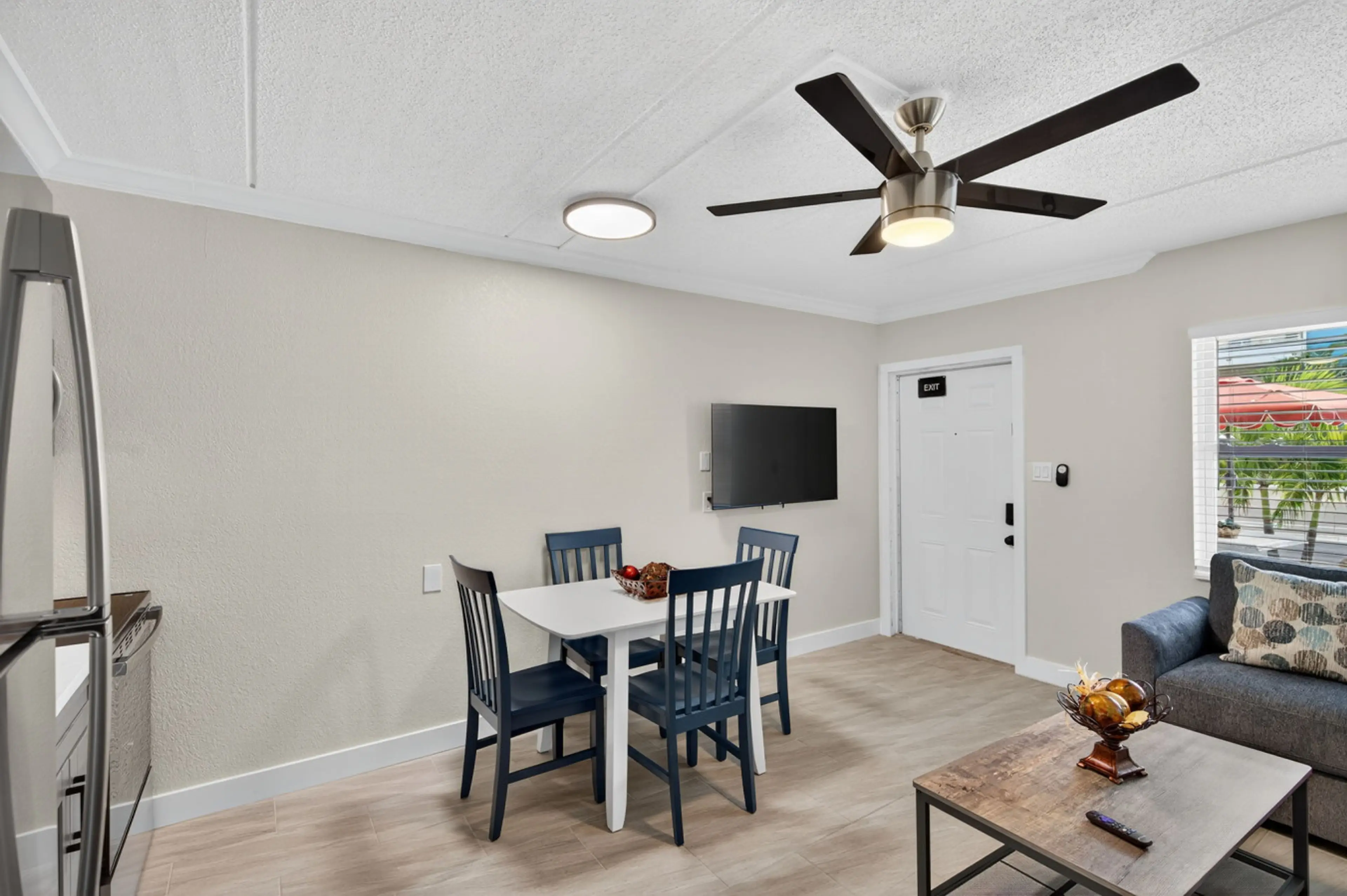 Open dining area w/ bar seating, perfect for easy meals, game nights, or planning the day together.