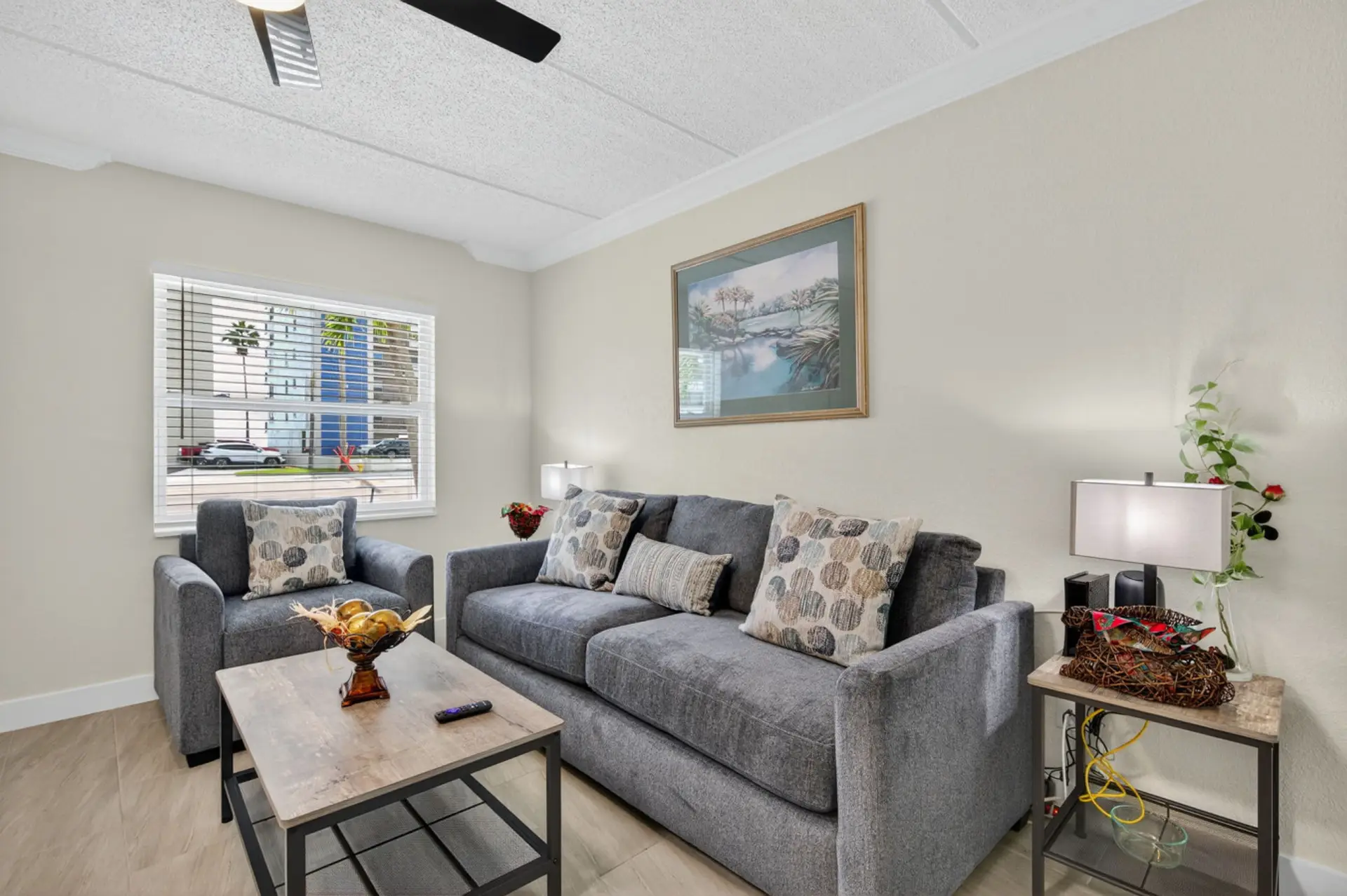 Bright & cozy living room w/ comfy seating, tasteful decor, and a relaxed vibe for unwinding after a full day.