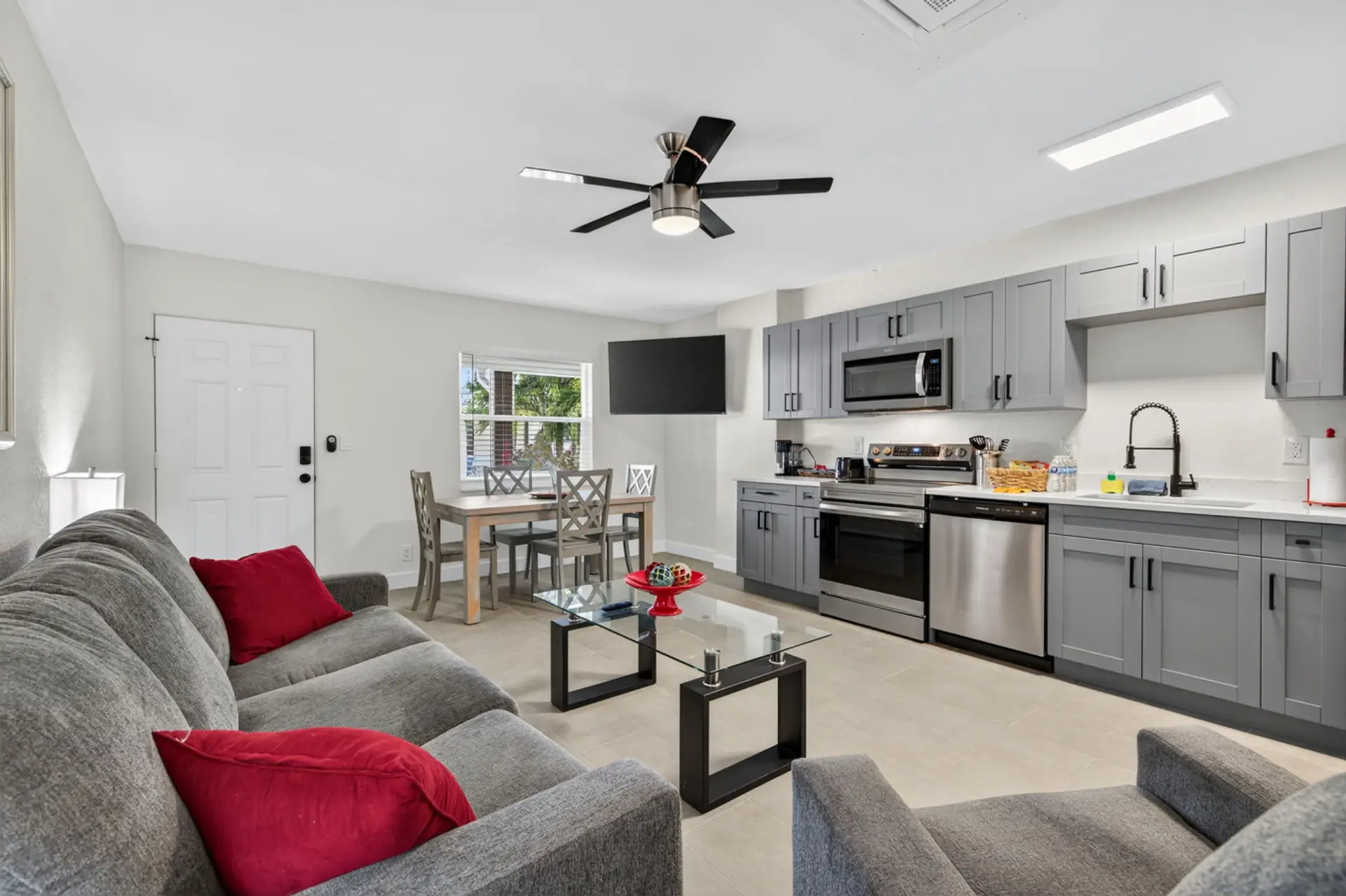 Fully renovated open living area blending kitchen, dining & lounge space