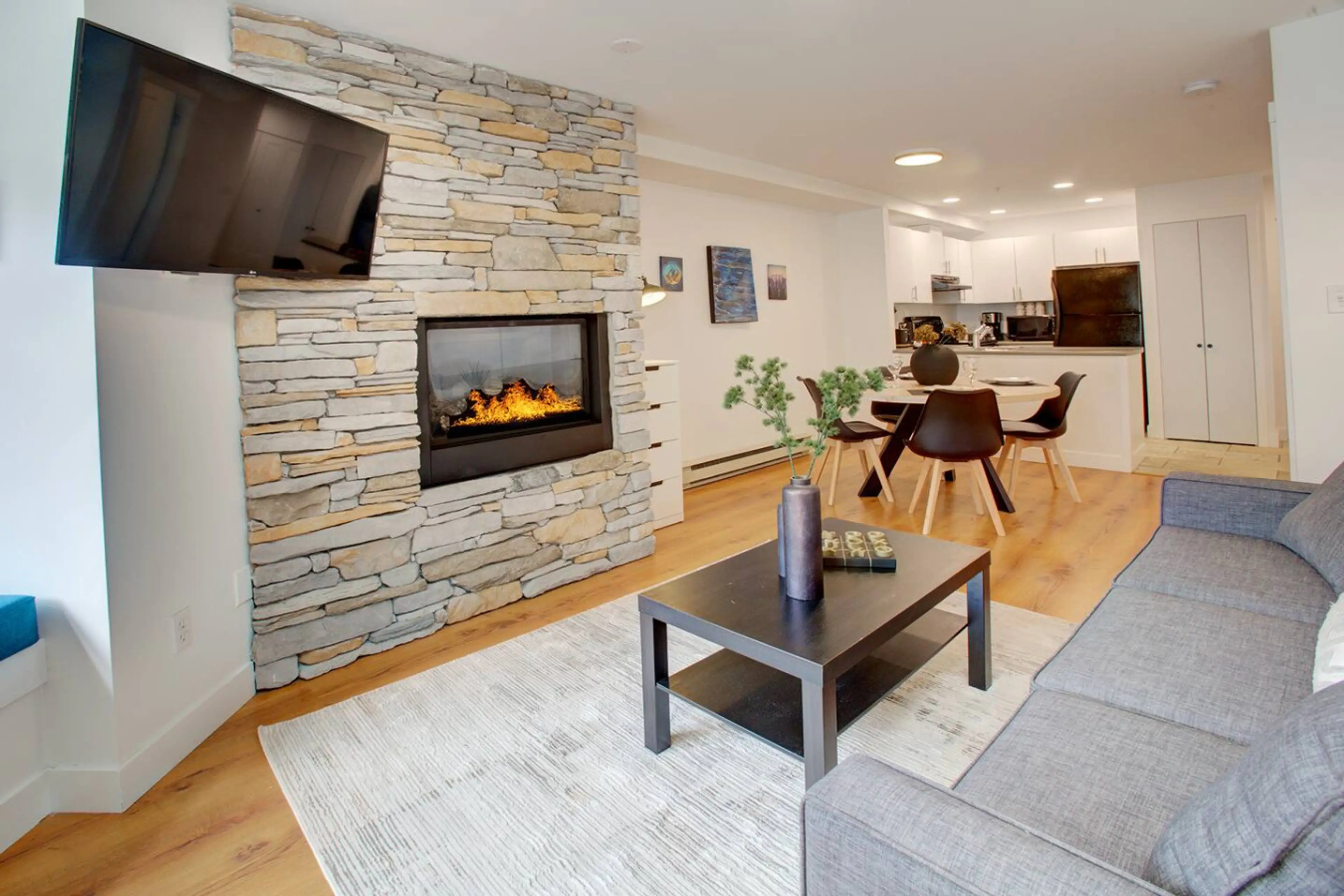 Spacious living room with smart tv and fire place