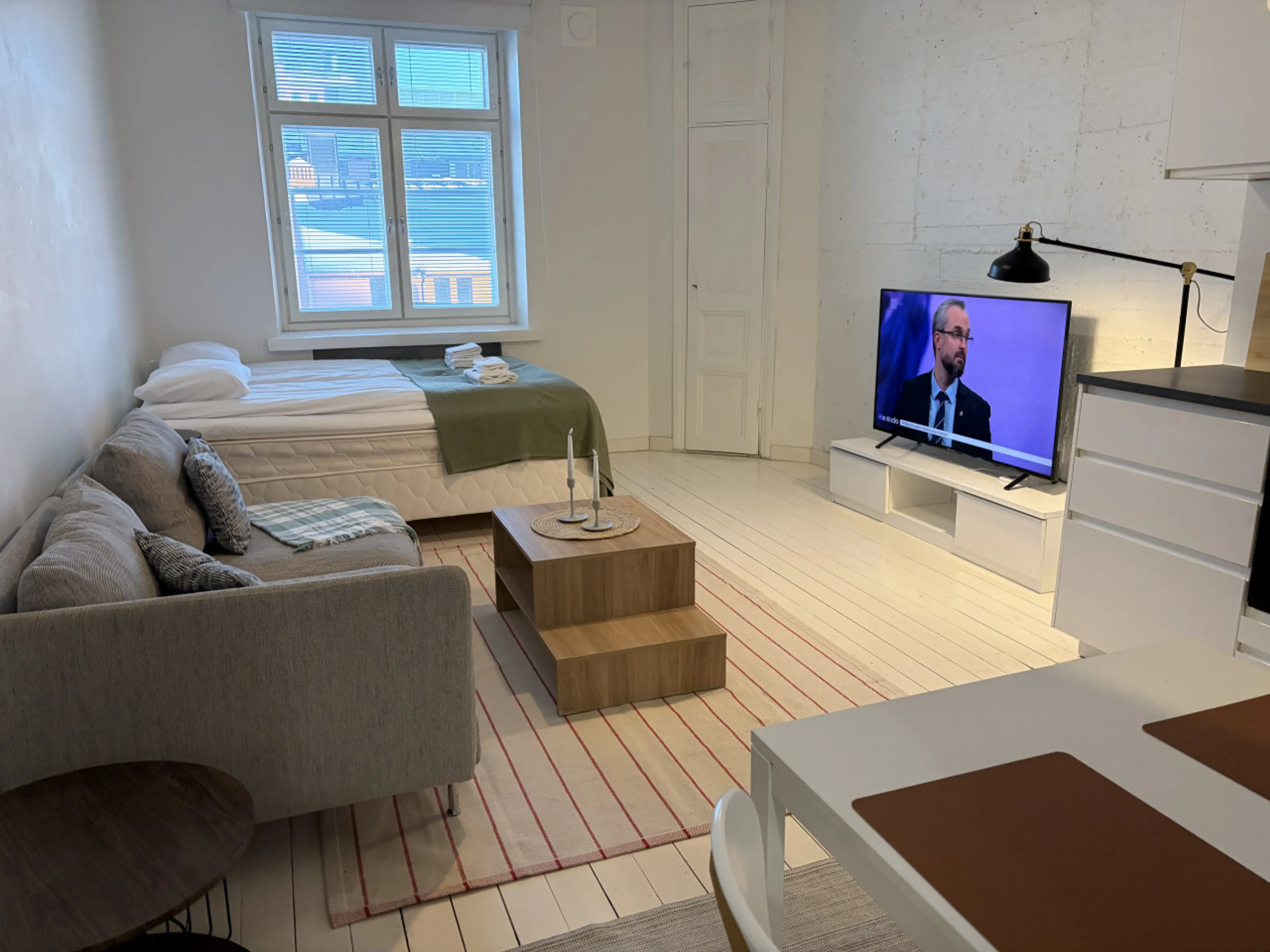 The living room and kitchen are one open space
