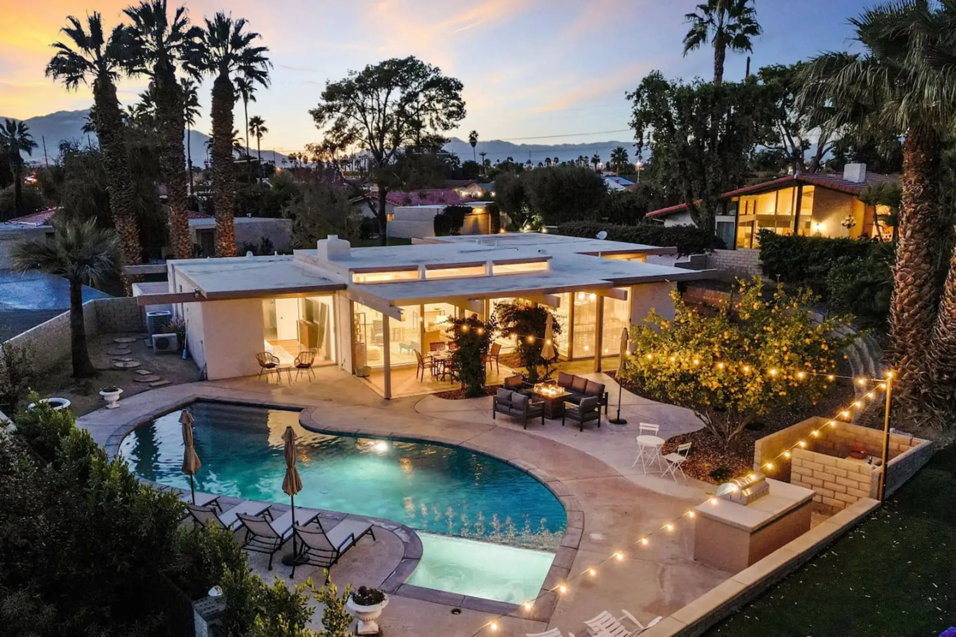 Huge backyard with heated pool, spa, BBQ, and tons of seating
