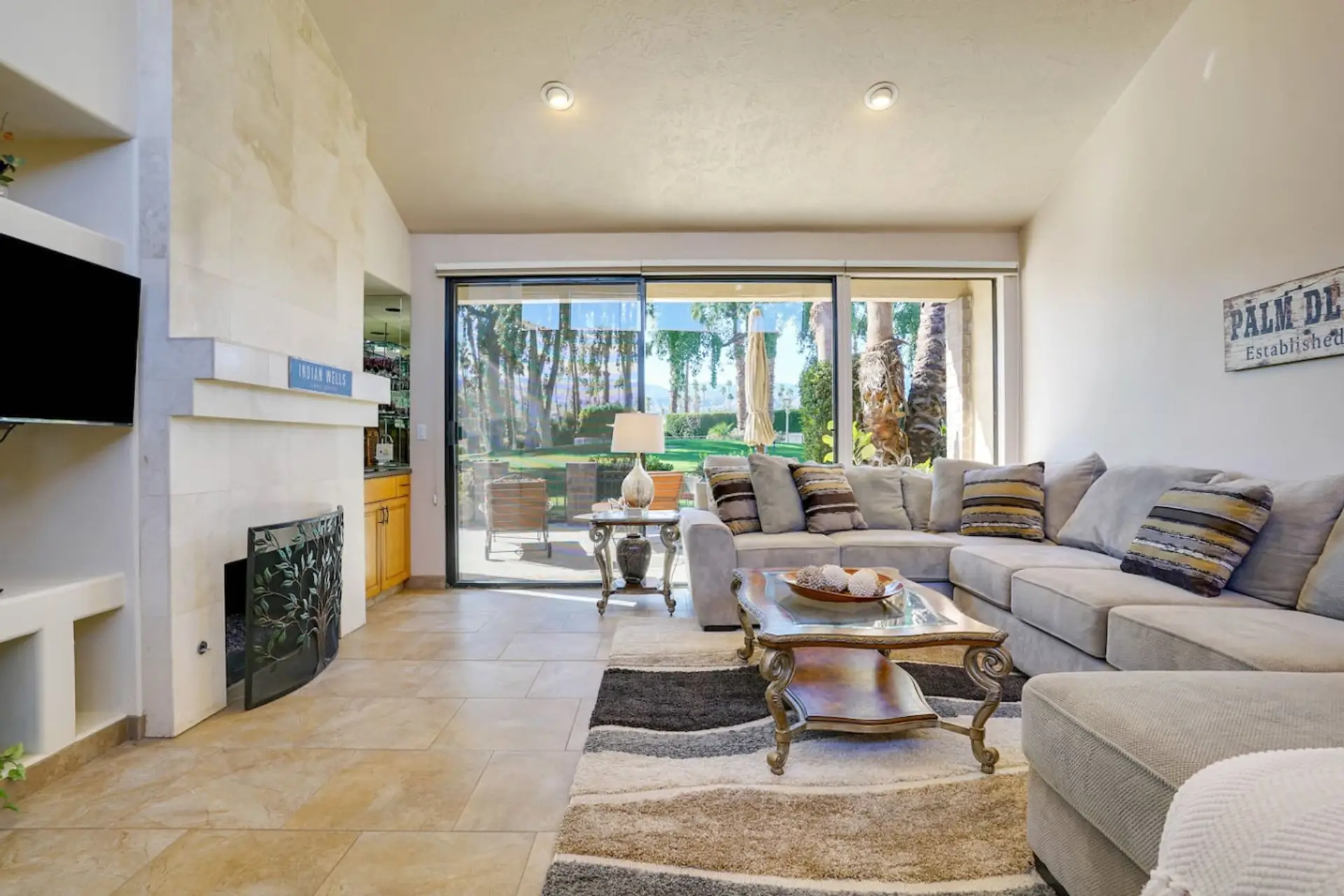 Large living area with a large glass panel sliding door