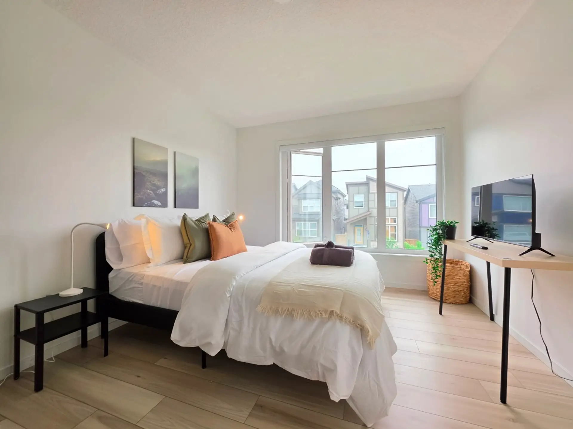 Primary Bedroom with Ensuite, Walk Through Closet and Smart TV