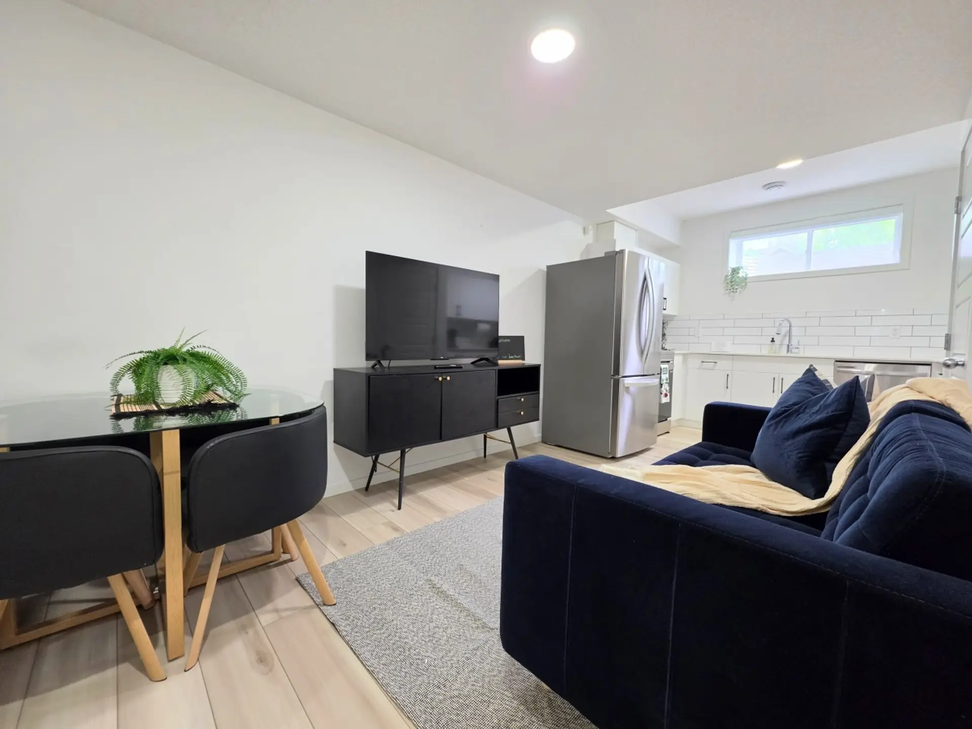 Lower Suite Open Concept Living w/Laundry