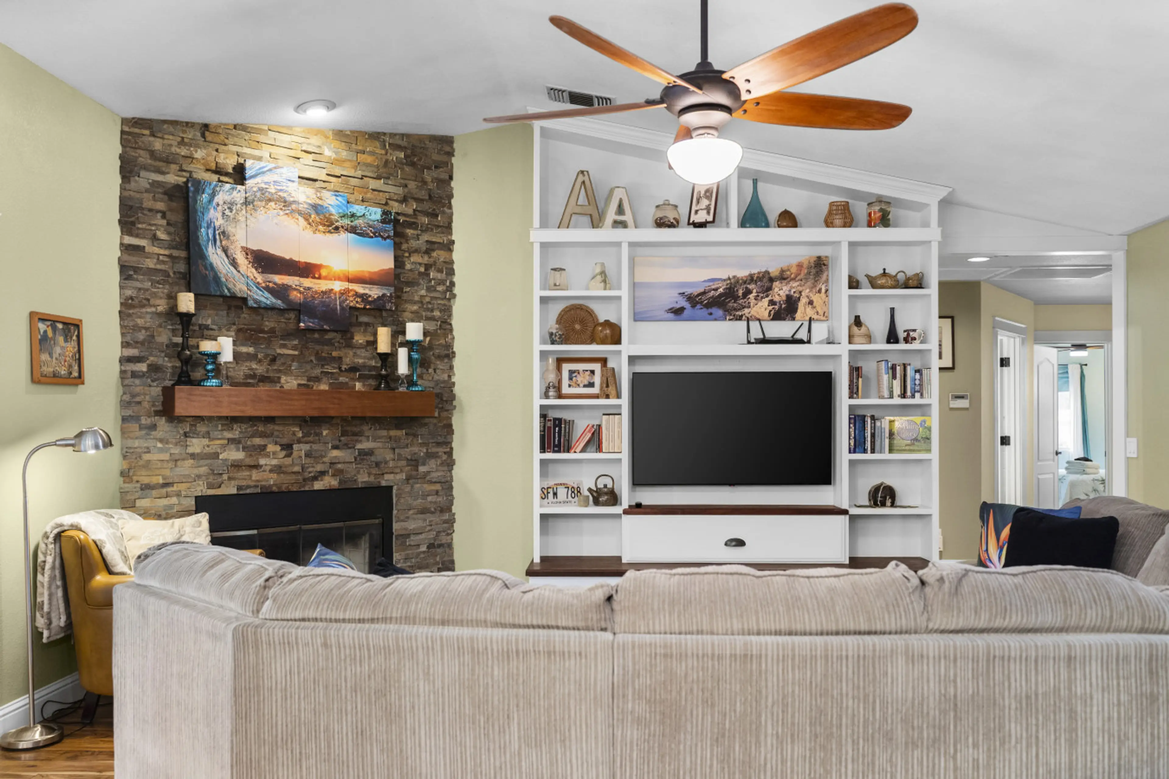 Family-friendly living room with a fireplace, flat-screen TV, and comfortable seating for relaxing evenings.
