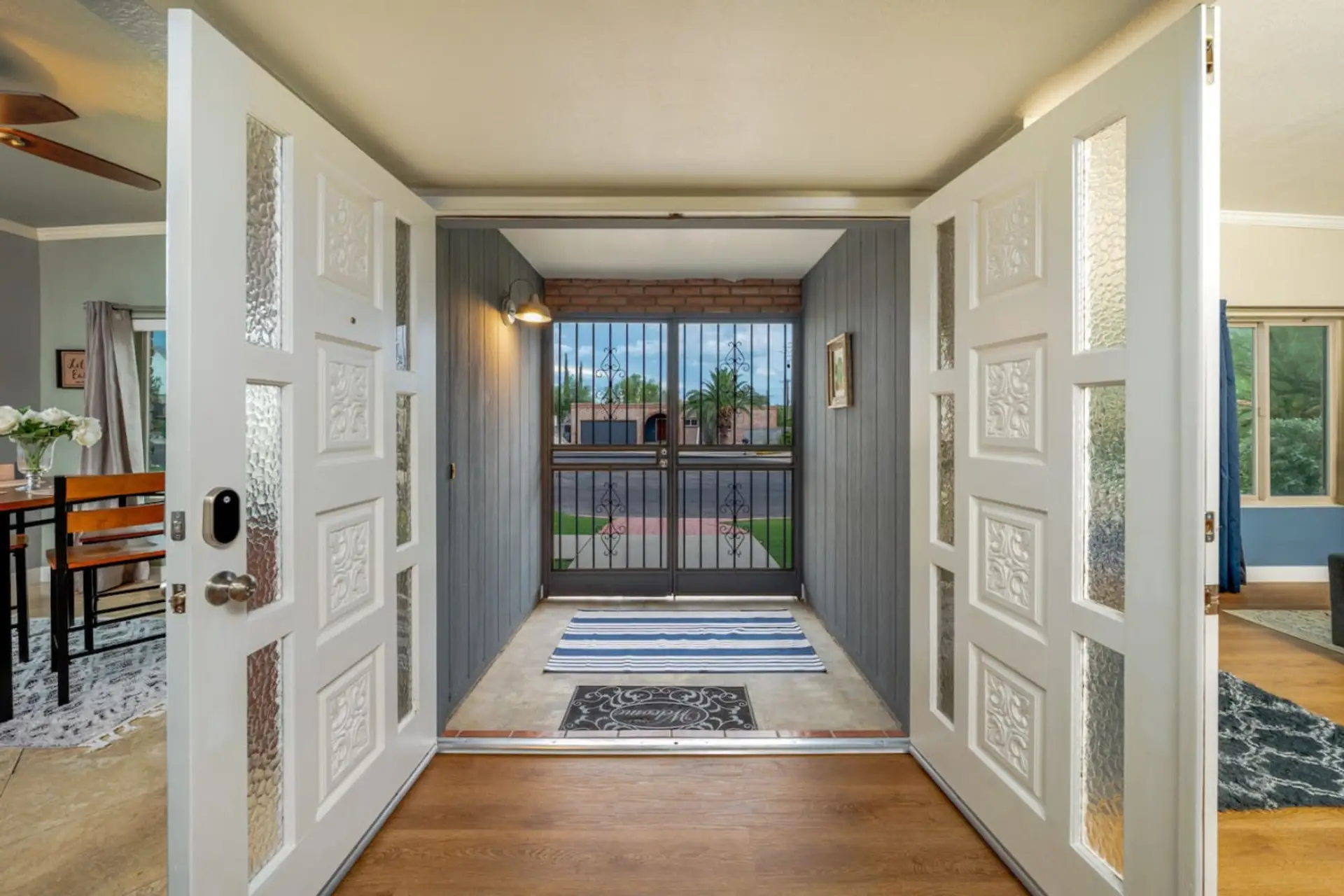 Light-filled entry hall connecting the kitchen and living room