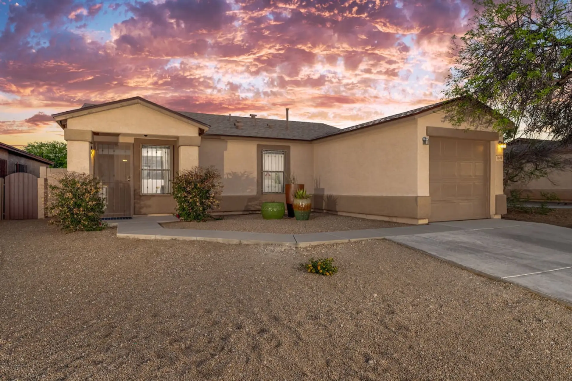 Exterior view of the home's front door entrance and single-car garage