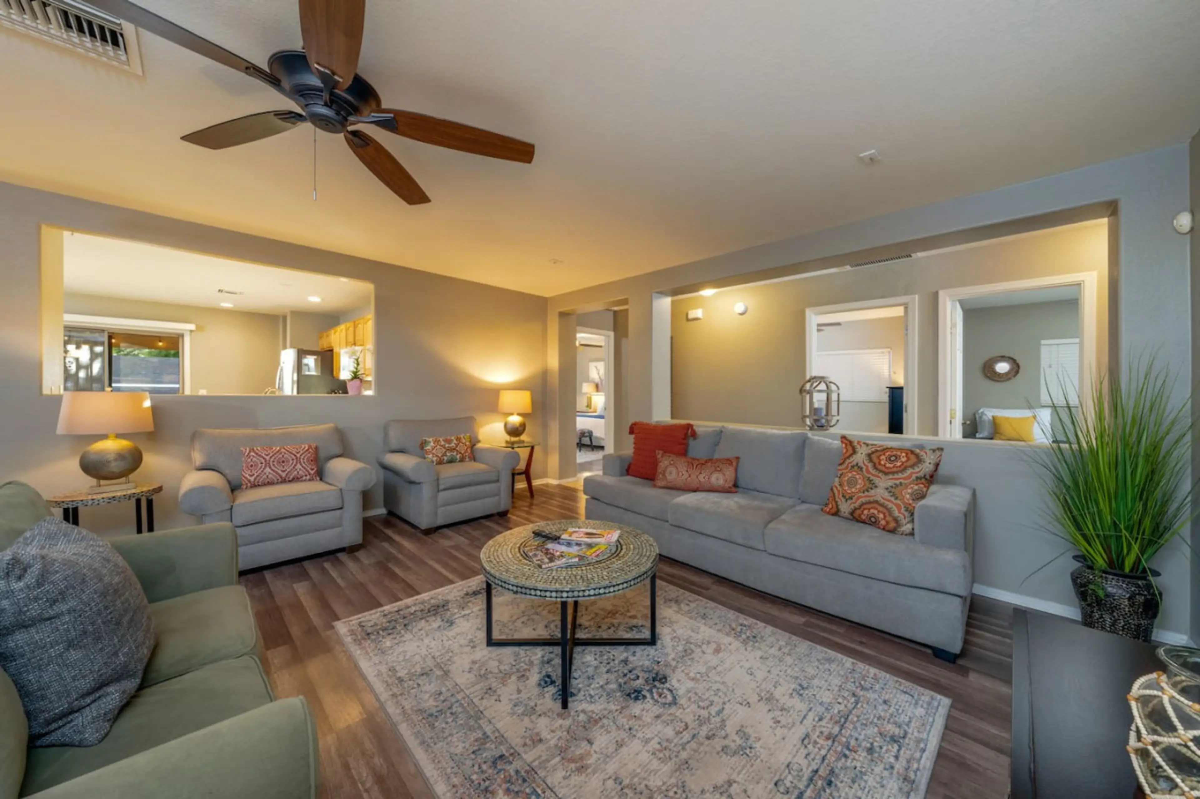 Spacious living room with lots of comfortable seating and smart TV