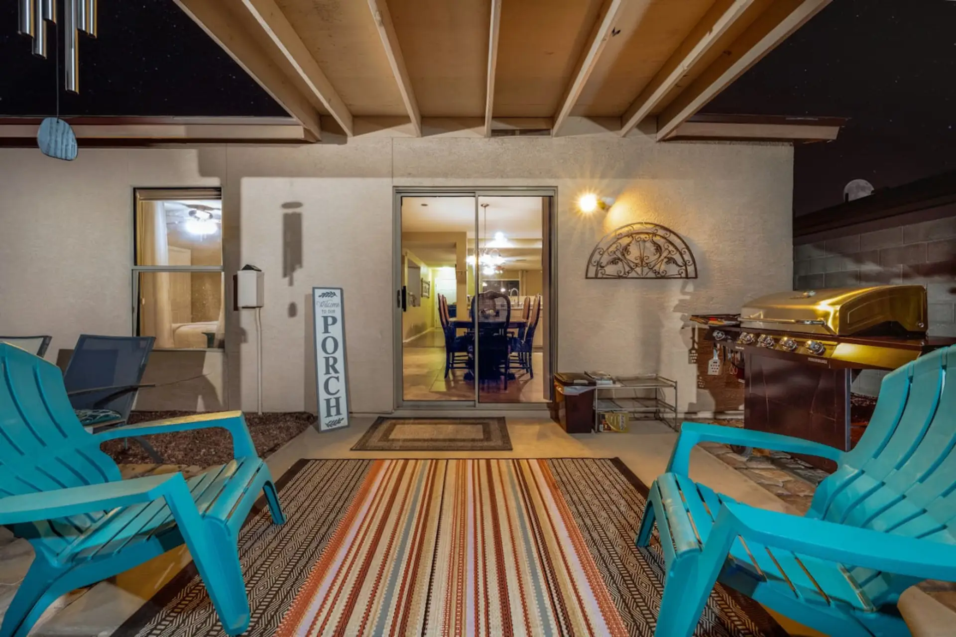 Covered back patio for relaxing and grilling