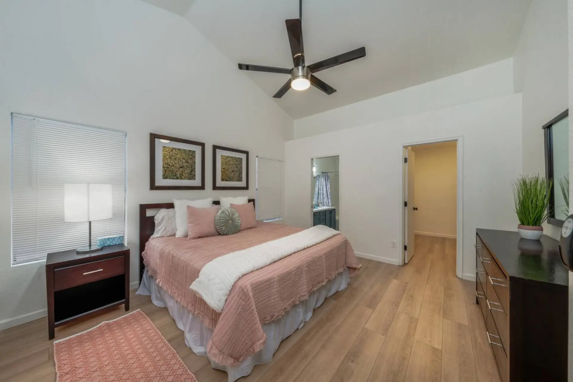 Primary bedroom with king-size bed and en-suite bathroom