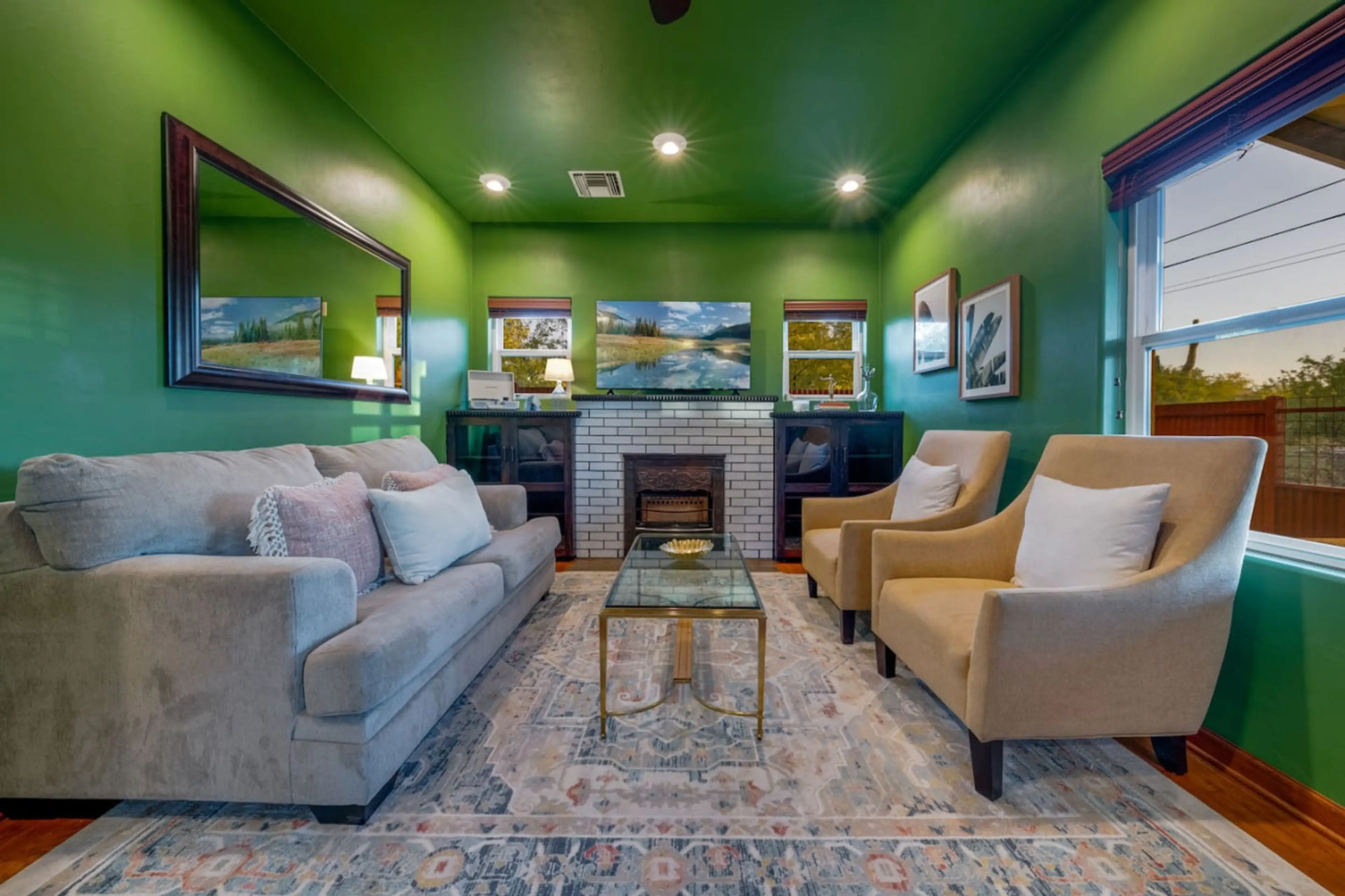 Living room with comfortable seating and smart TV (fireplace is nonfunctional)
