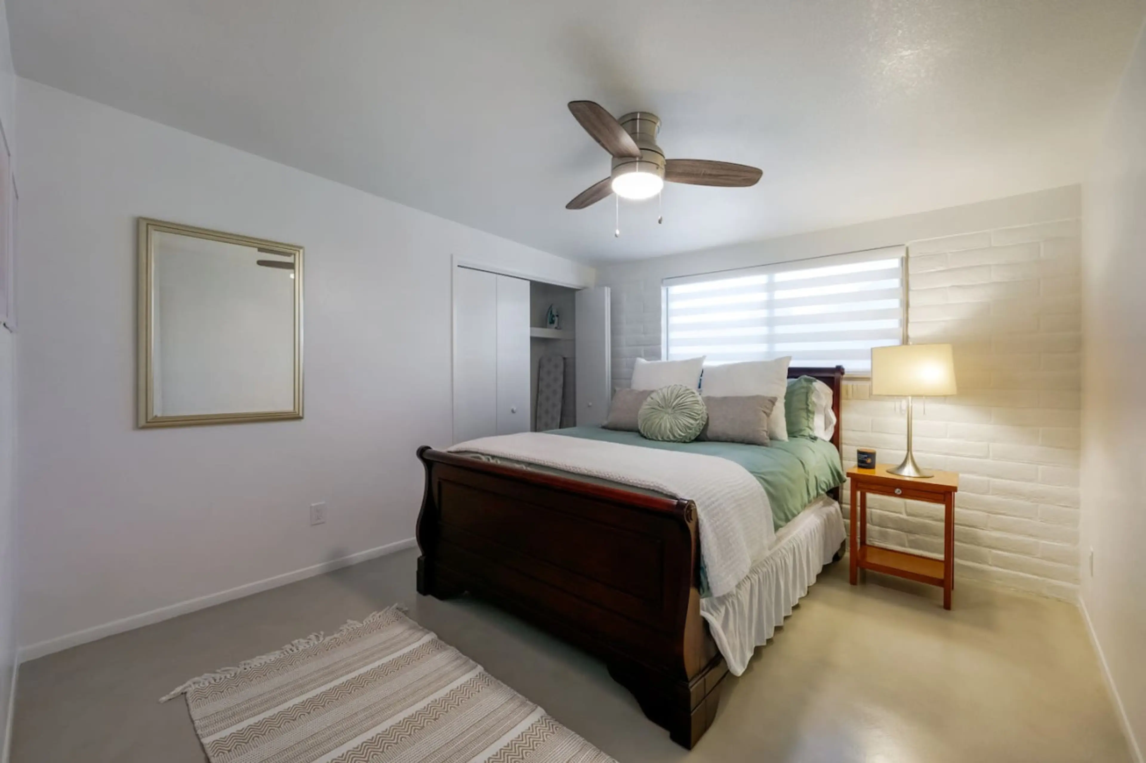 Bedroom 2 with queen-size bed and closet