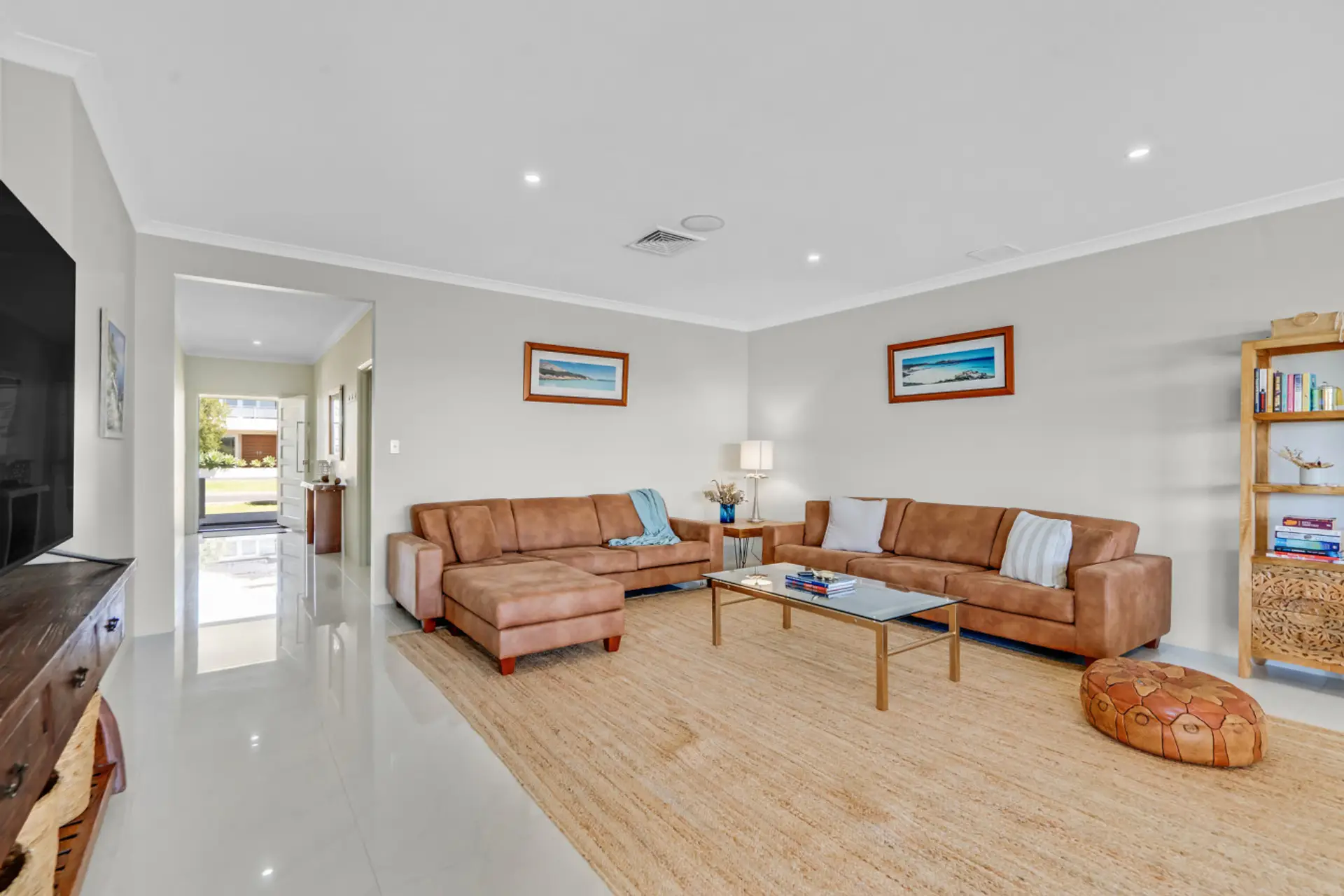 Unwind in the stylish open-plan living area, perfect for movie nights or lazy afternoons.