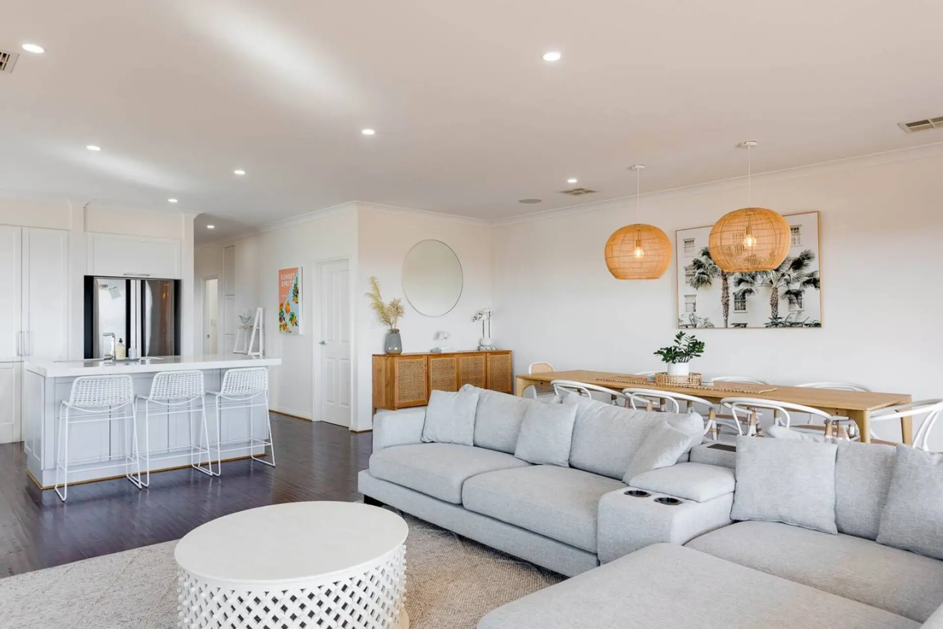 The gray sofa is a stunning centerpiece in this living room, adding a touch of sophistication and elegance to the space.