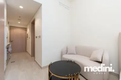 Entrance hallway opening onto the seating corner and kitchenette