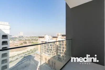 Open balcony with glass balustrade facing the neighbourhood