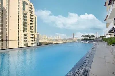 Stylish 1BR Apartment | Pool, Gym & Parking in JVC
