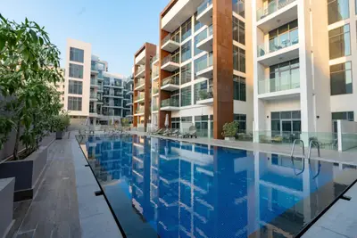 Elegant 1BR + Kids Room | Pool, Gym & Parking