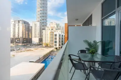 Elegant 1BR + Kids Room | Pool, Gym & Parking